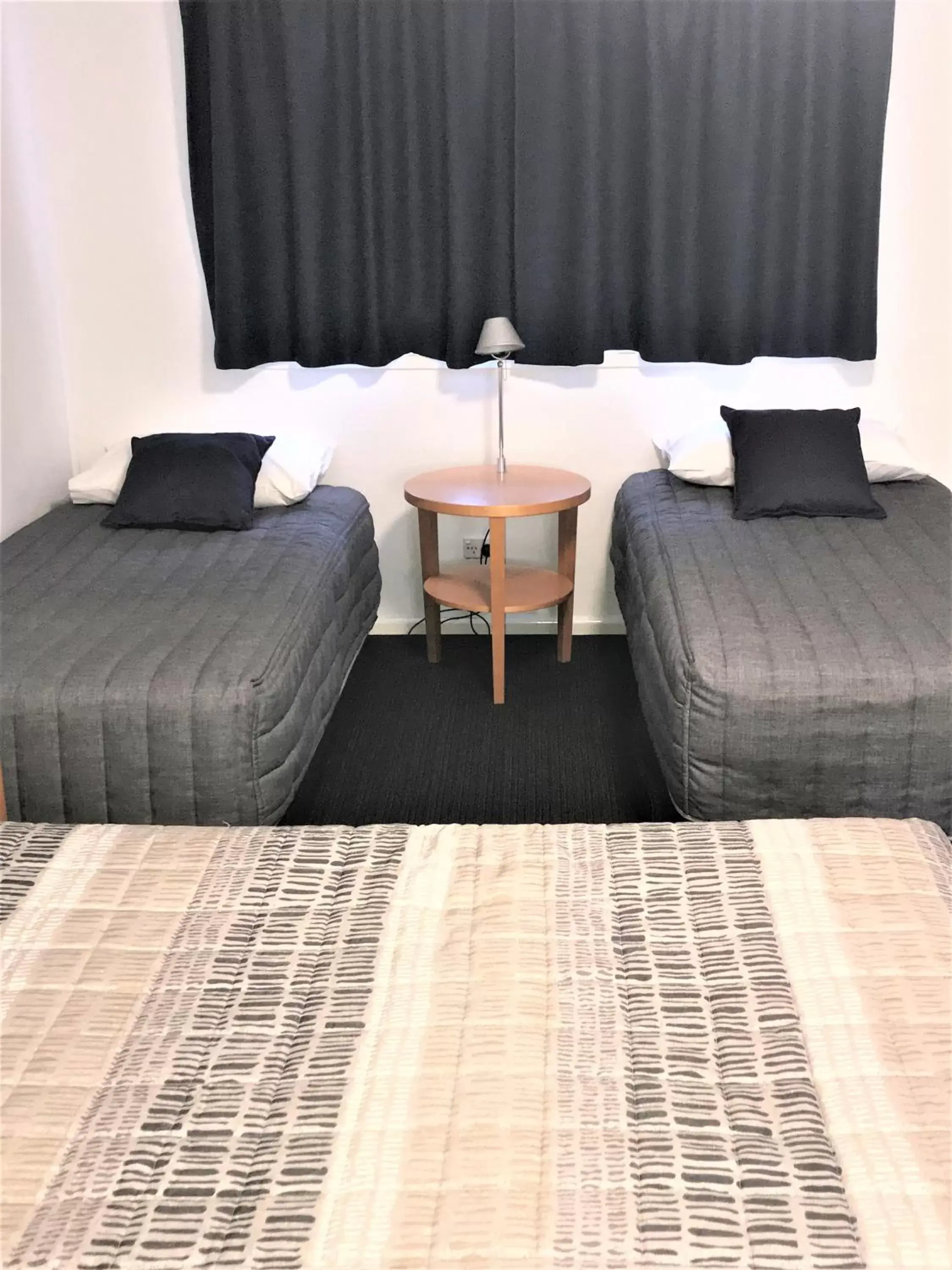 Bed in Culburra Beach Motel