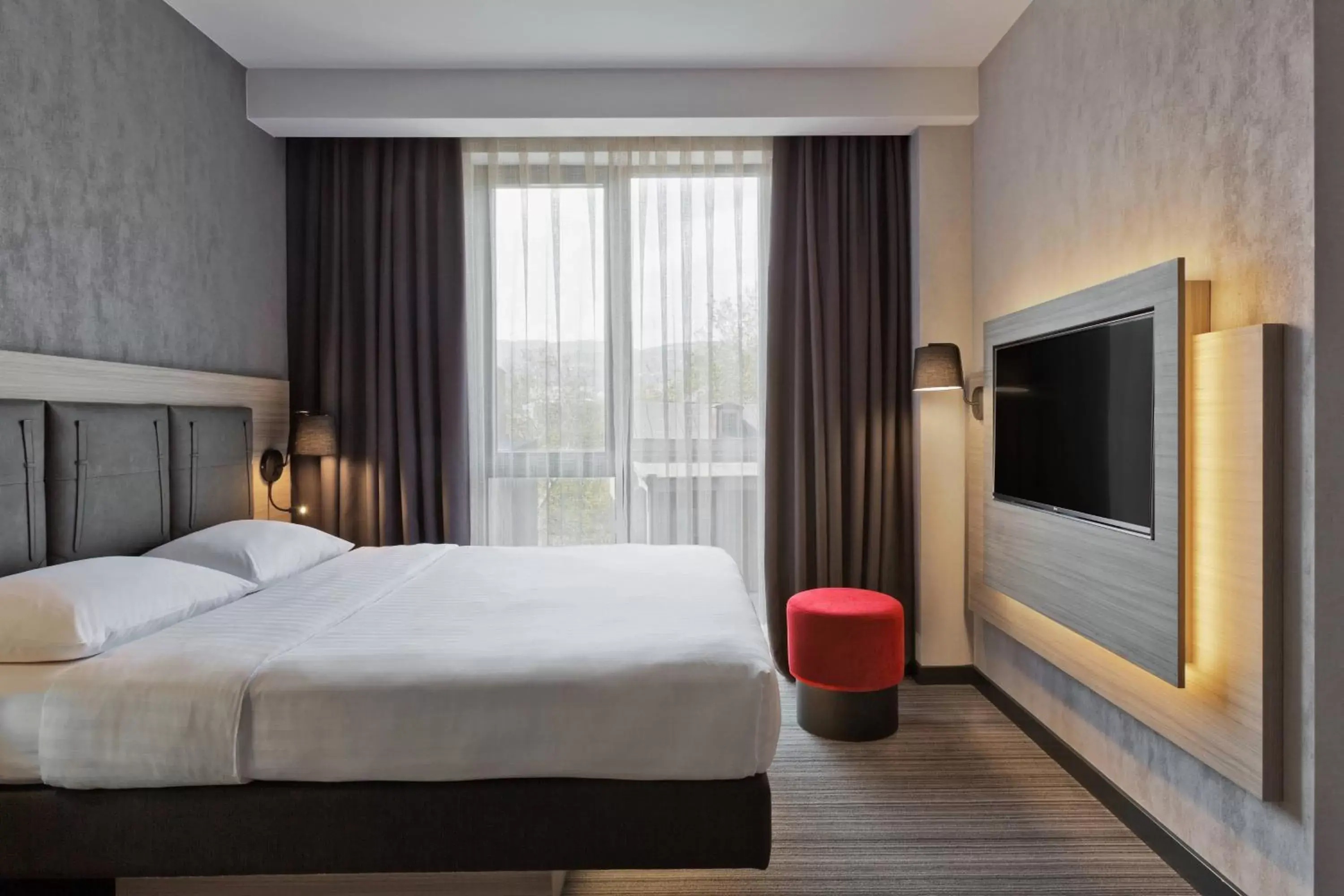 Photo of the whole room, Bed in Moxy by Marriott Tbilisi