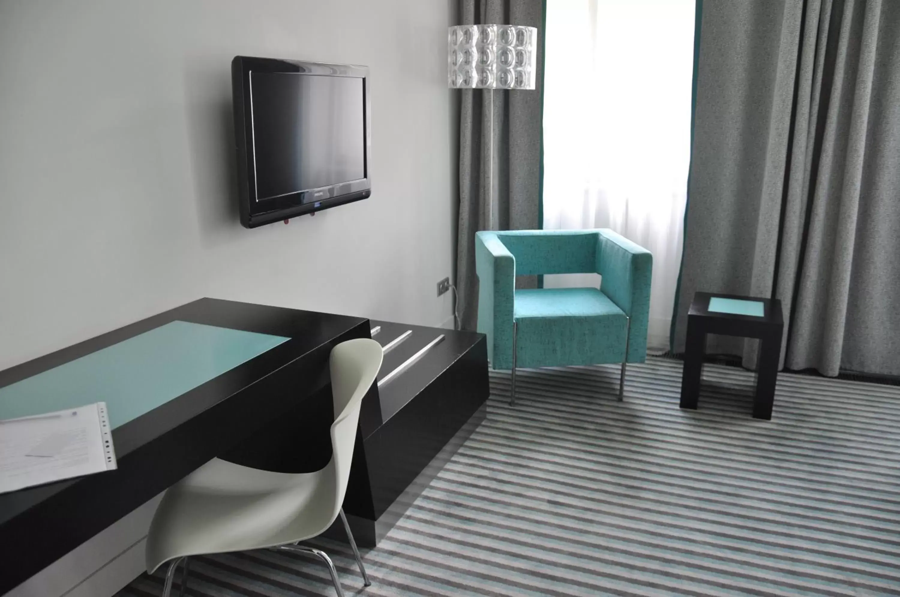 TV and multimedia, TV/Entertainment Center in Red & Blue Design Hotel Prague