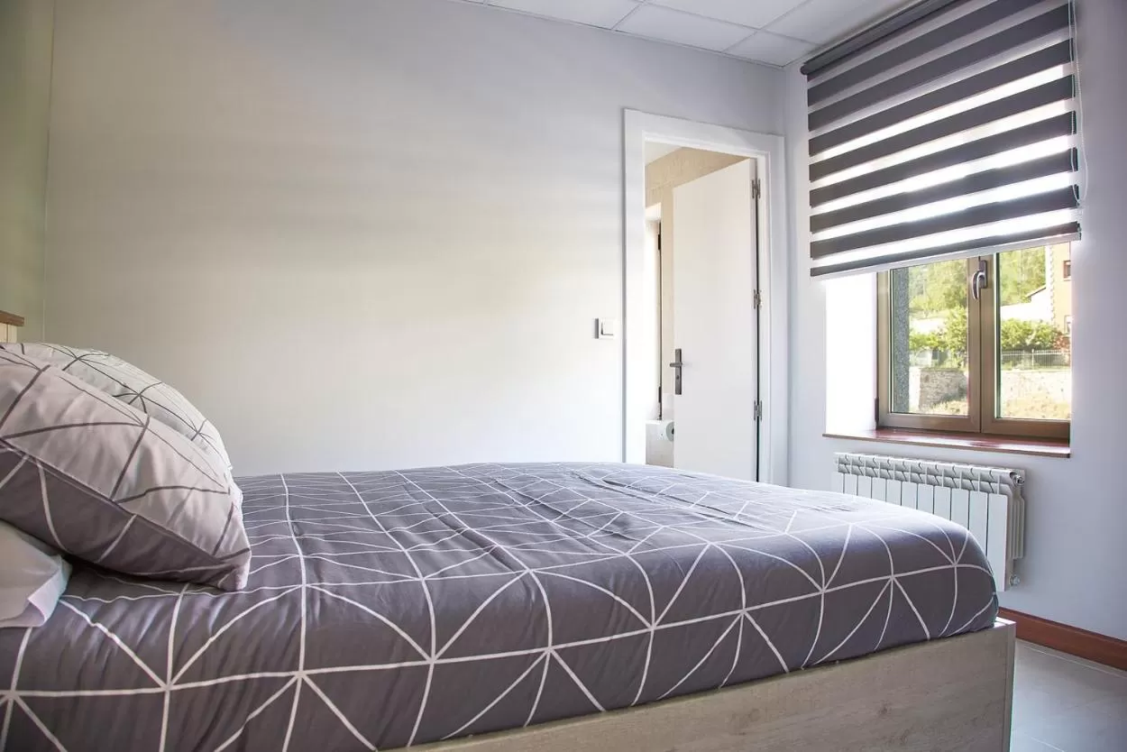 Bed in HOSTAL FONTAÑAN