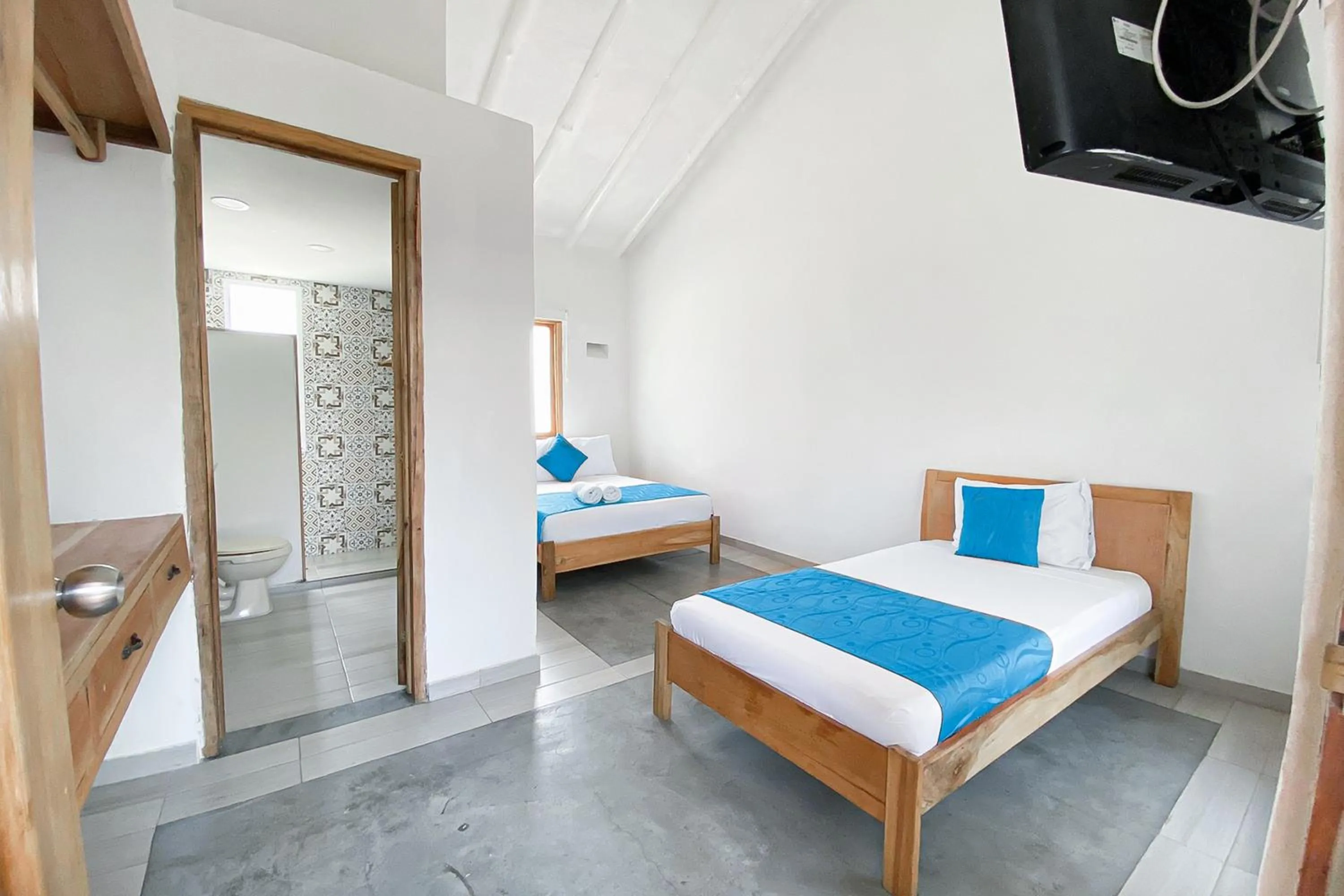 Twin Room in Hotel Sansiraka Suites By GEH Suites