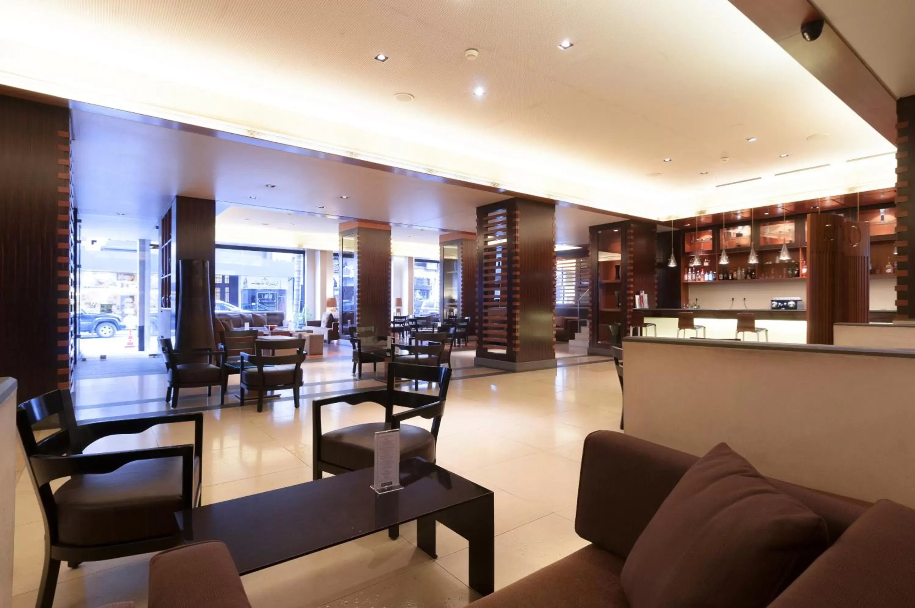 Lobby or reception, Lounge/Bar in Le Commodore Hotel