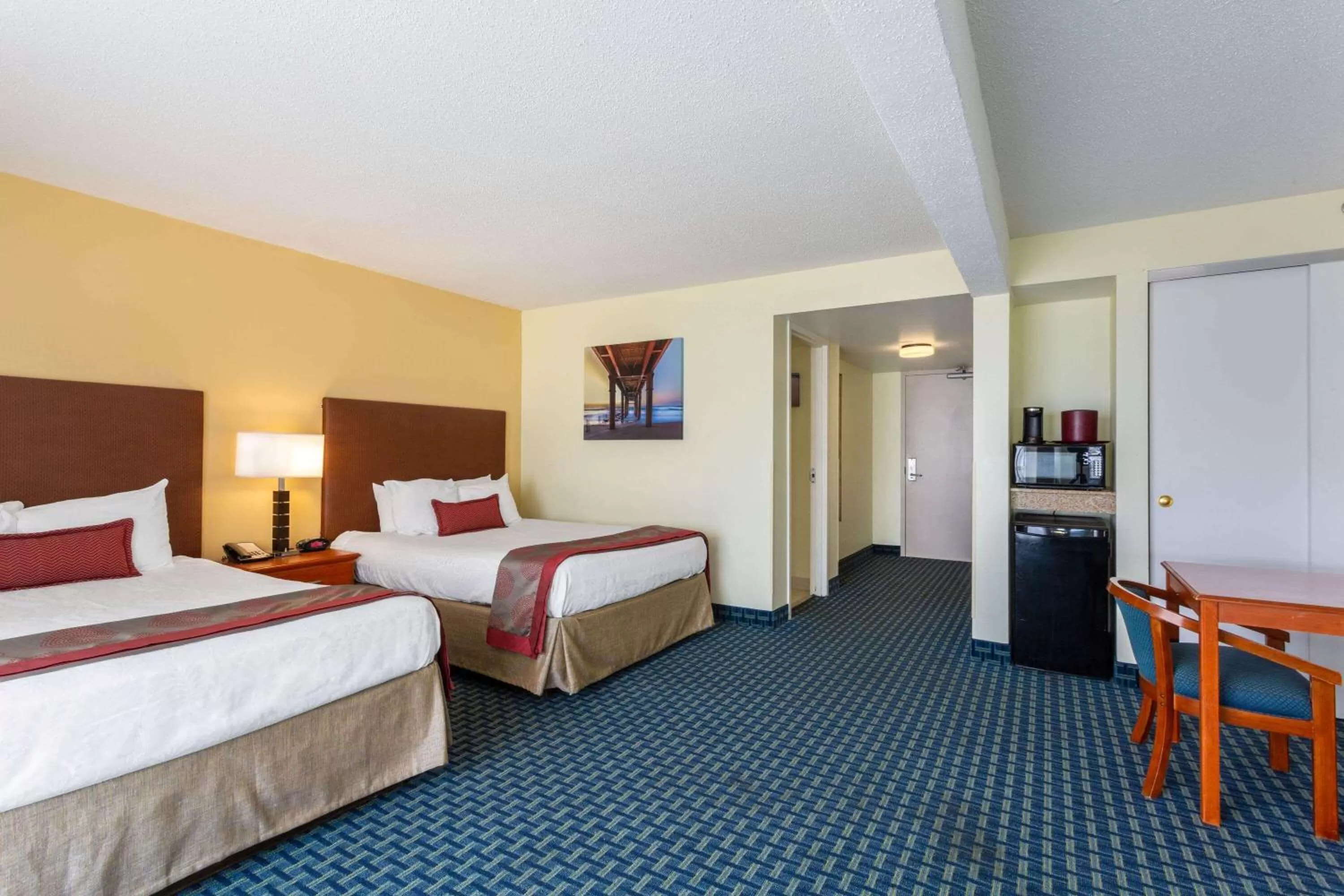 Photo of the whole room, Bed in Ramada Plaza by Wyndham Virginia Beach Oceanfront