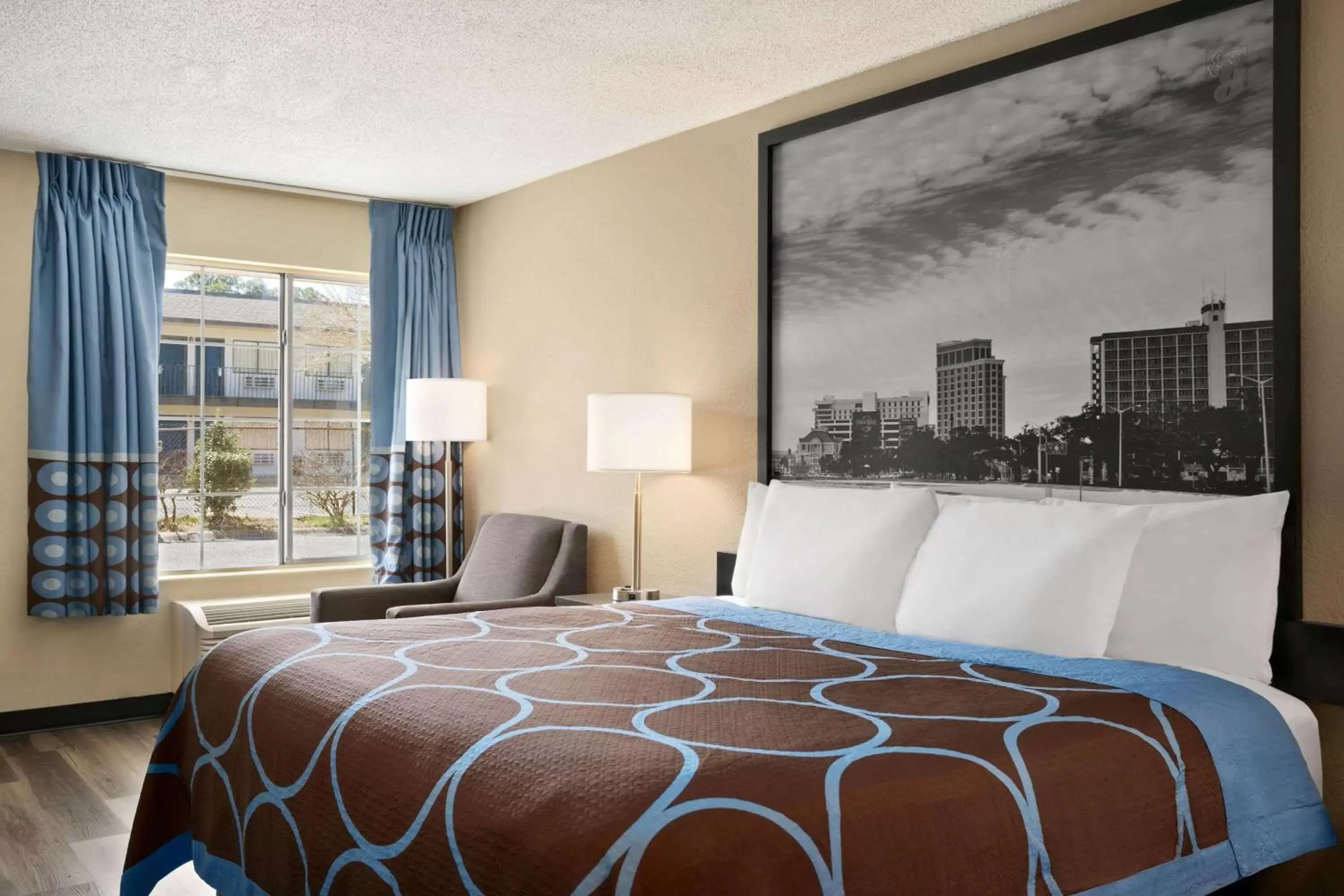 Bedroom, Bed in Super 8 by Wyndham Gulfport Airport NW Near Biloxi Bedroom, Bed in Super 8 by Wyndham Gulfport Airport NW Near Biloxi