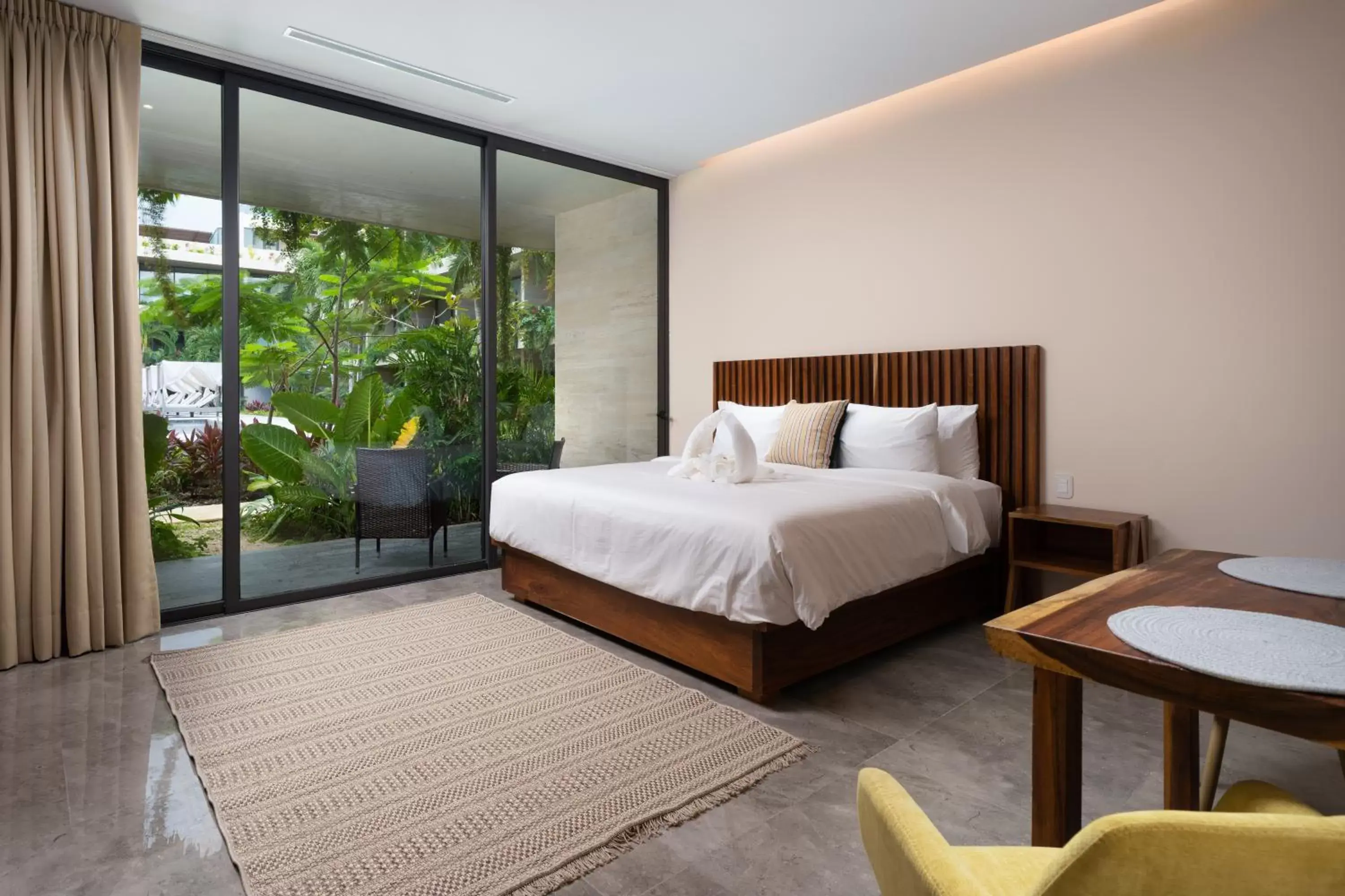 Photo of the whole room, Bed in MISTIQ Tulum Luxury Apartments