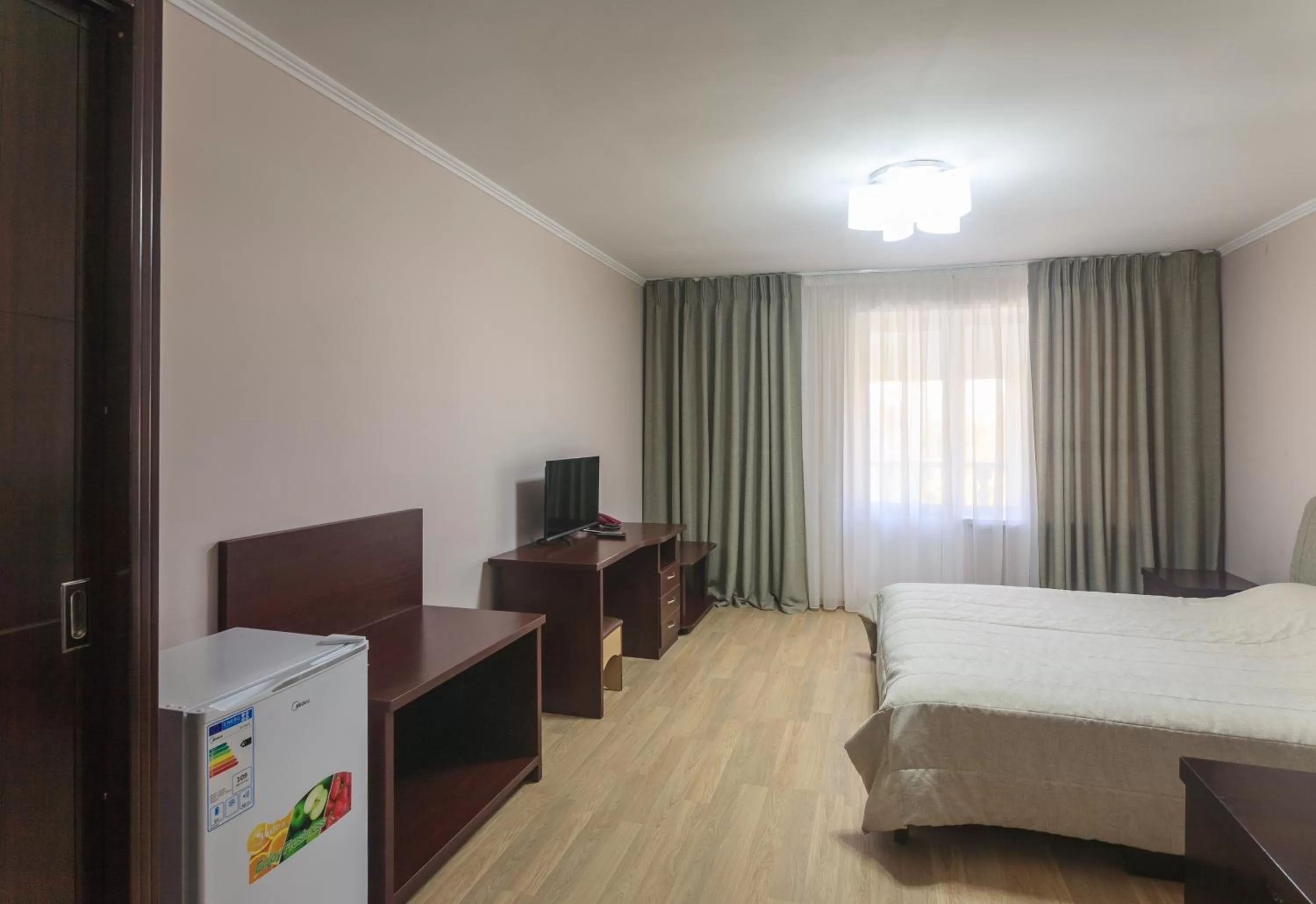 Photo of the whole room, TV/Entertainment Center in Sunkar Hotel