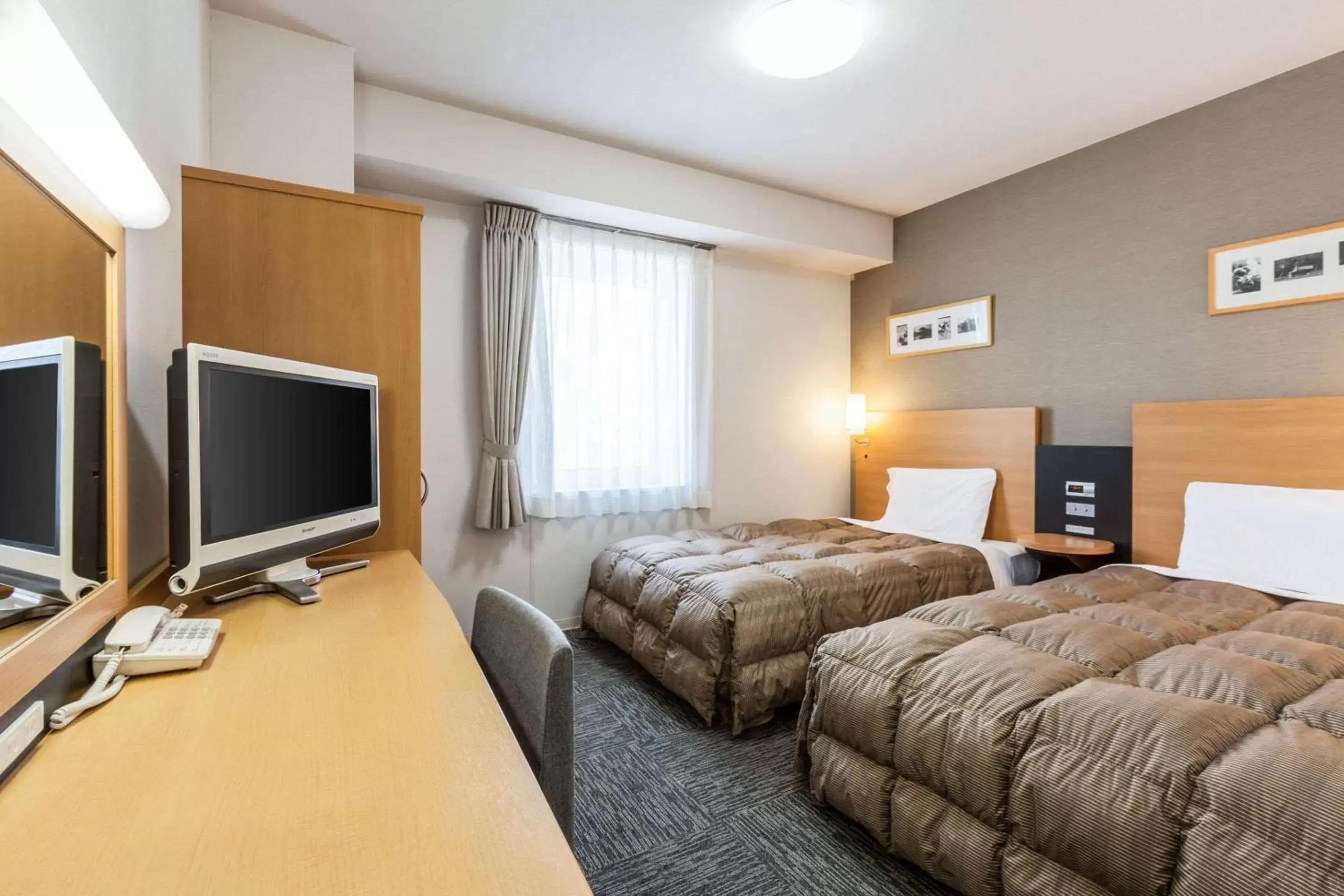 Photo of the whole room, Bed in Comfort Hotel Kushiro