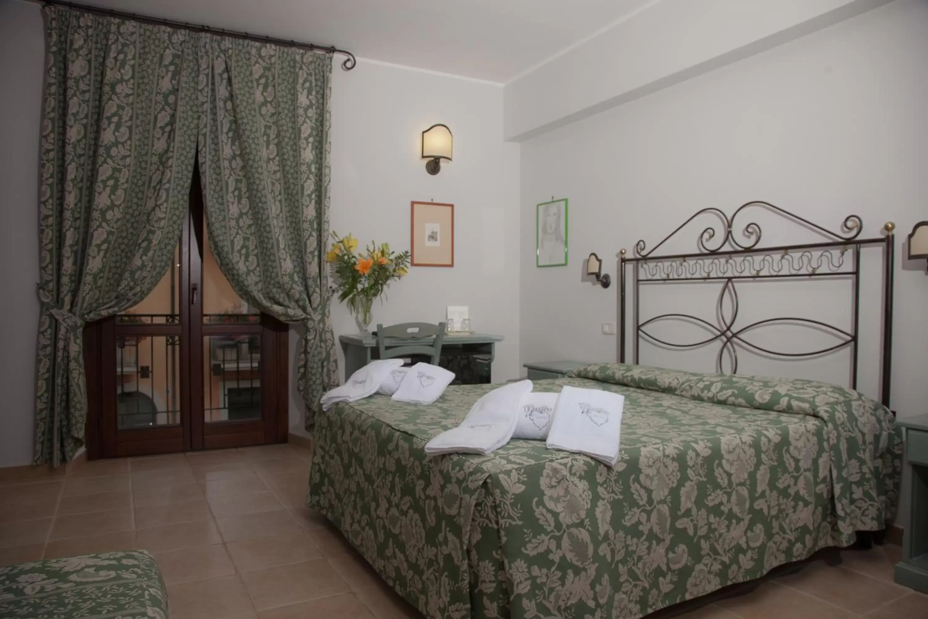 Quadruple Room with Balcony in Hotel Il Tiglio