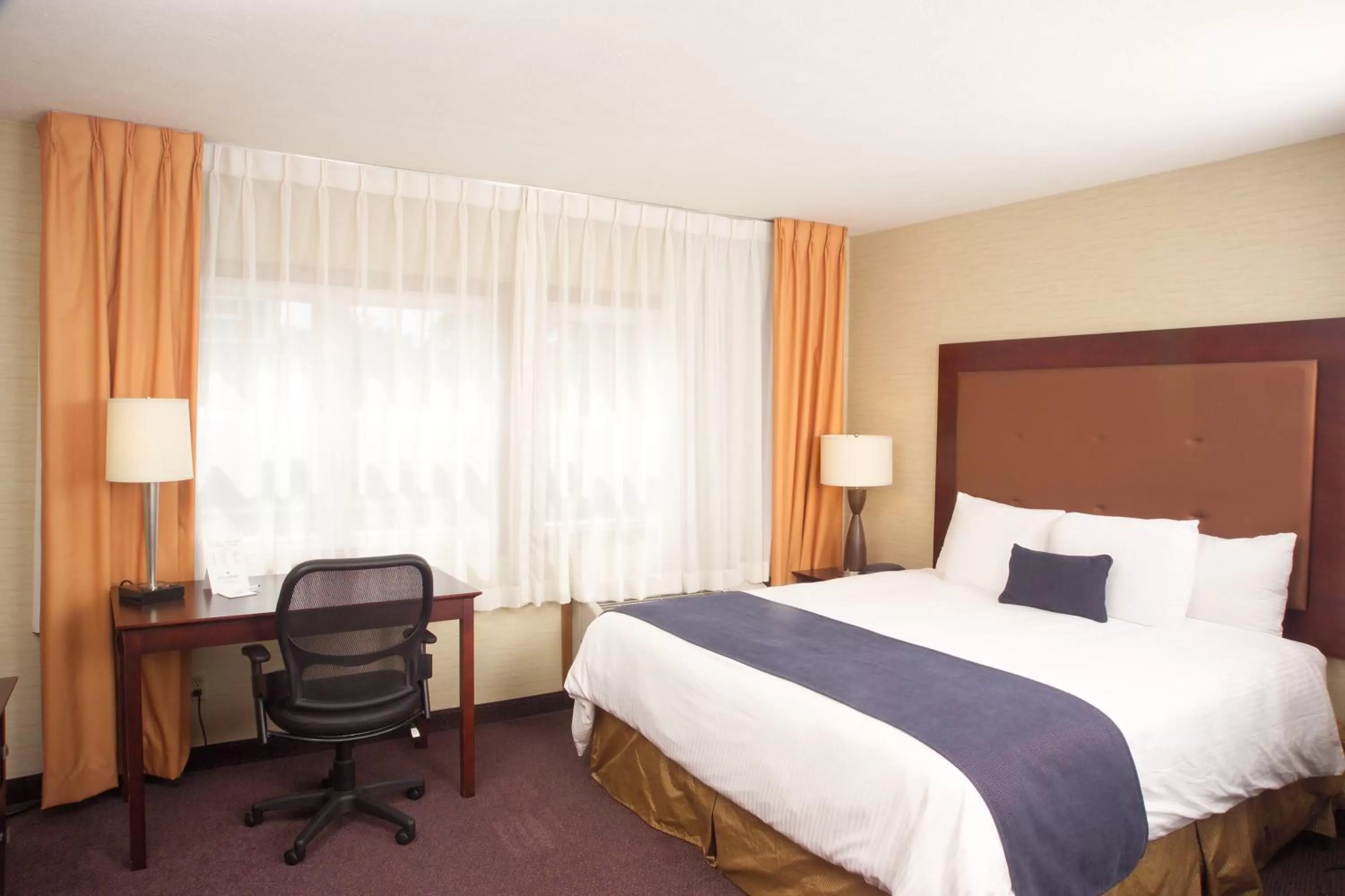 Bedroom, Bed in Ivy Court Inn and Suites