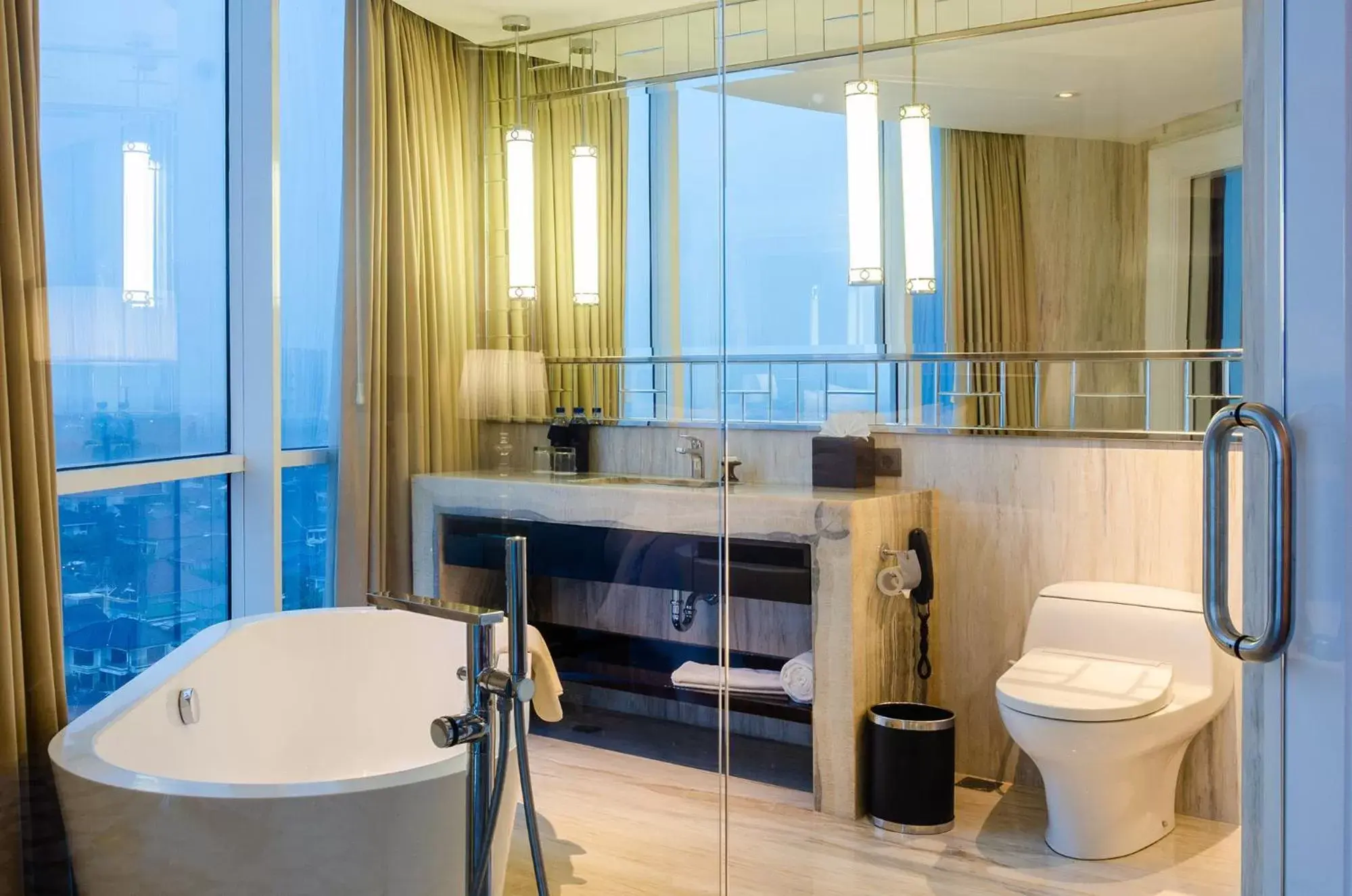 Bathroom in Hotel Ciputra World Surabaya managed by Swiss-Belhotel International