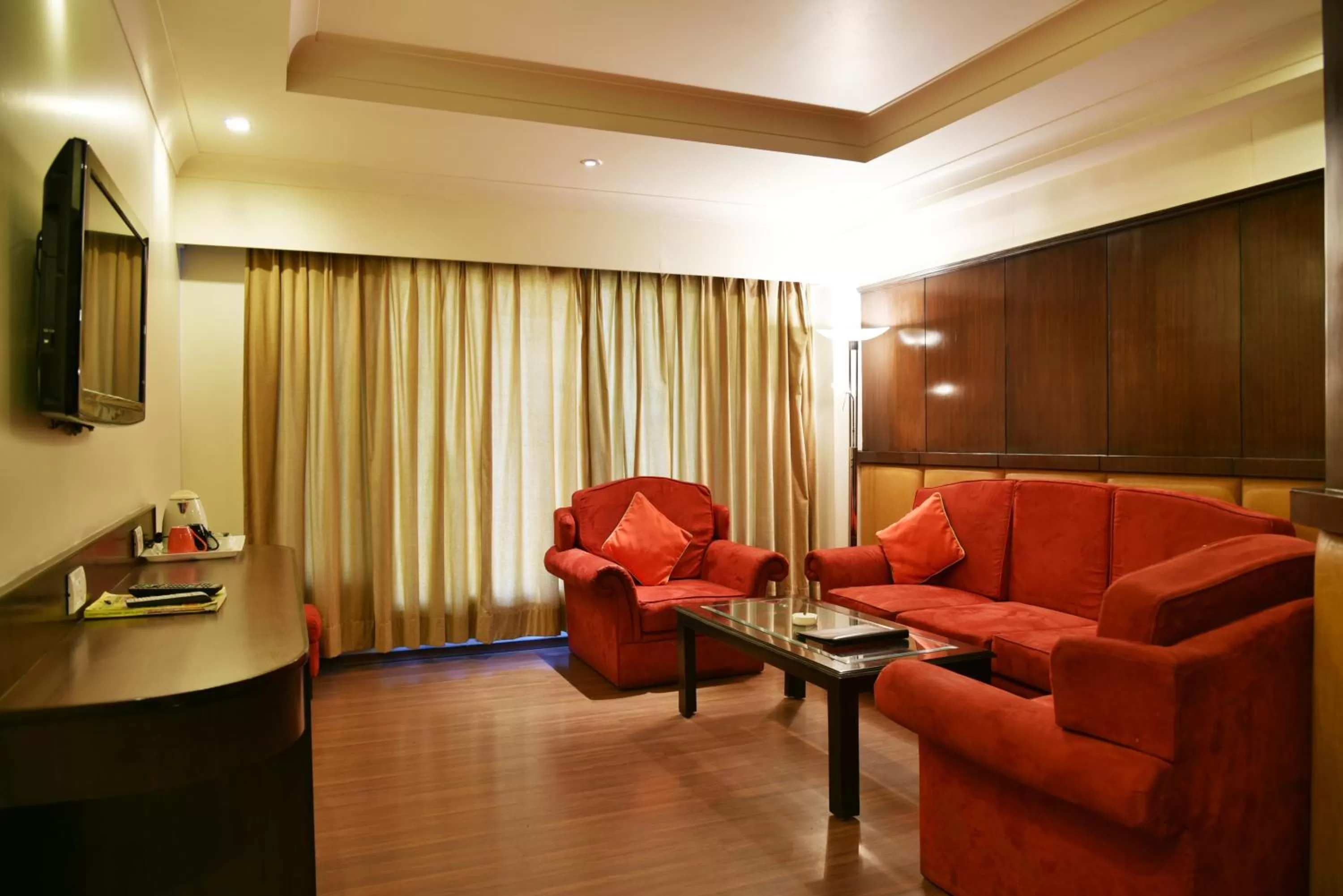 Living room in Indraprastha Resort - Centrally Heated Rooms, with Gym, Games & Spa