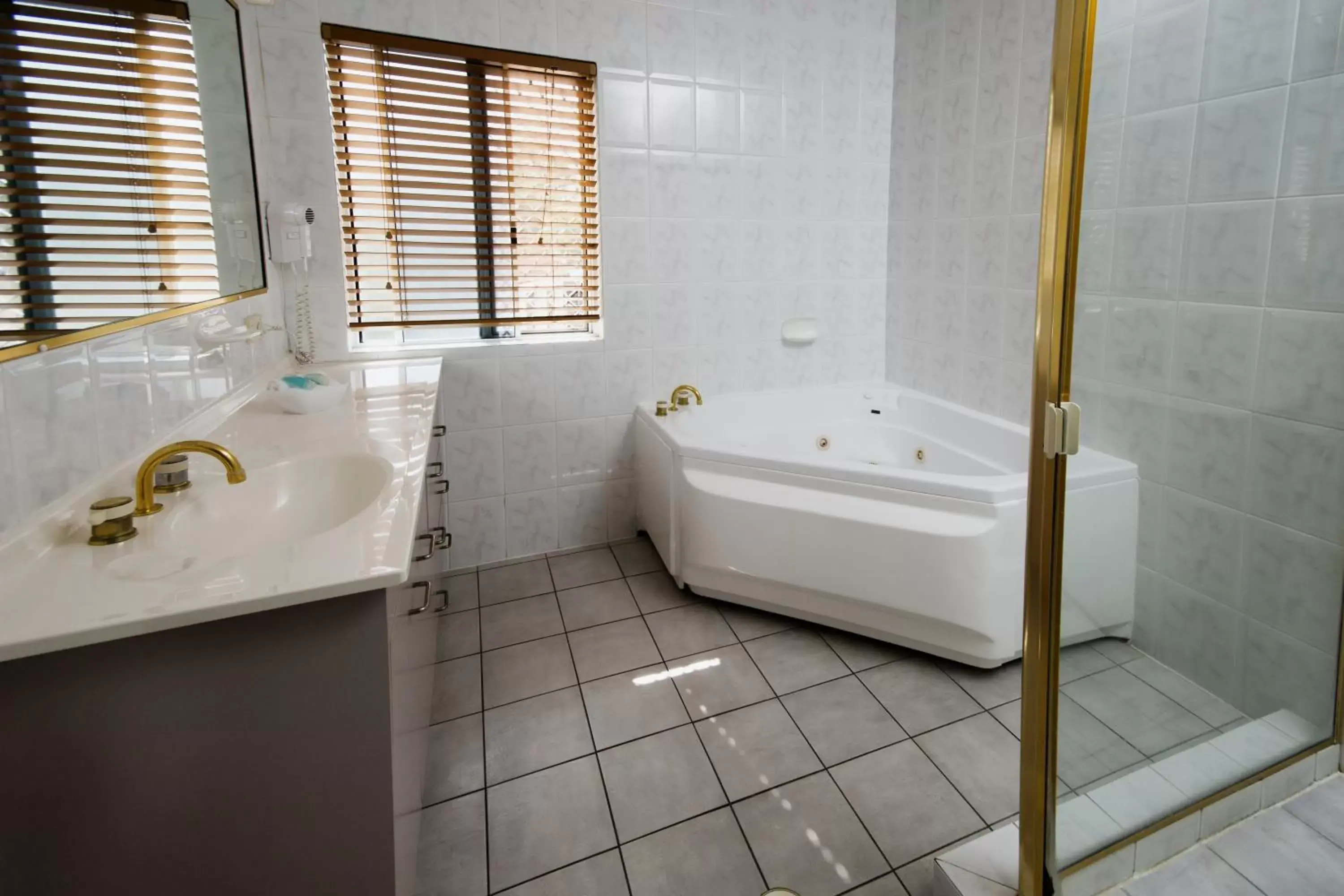 Shower, Bathroom in The Beach Motel Hervey Bay