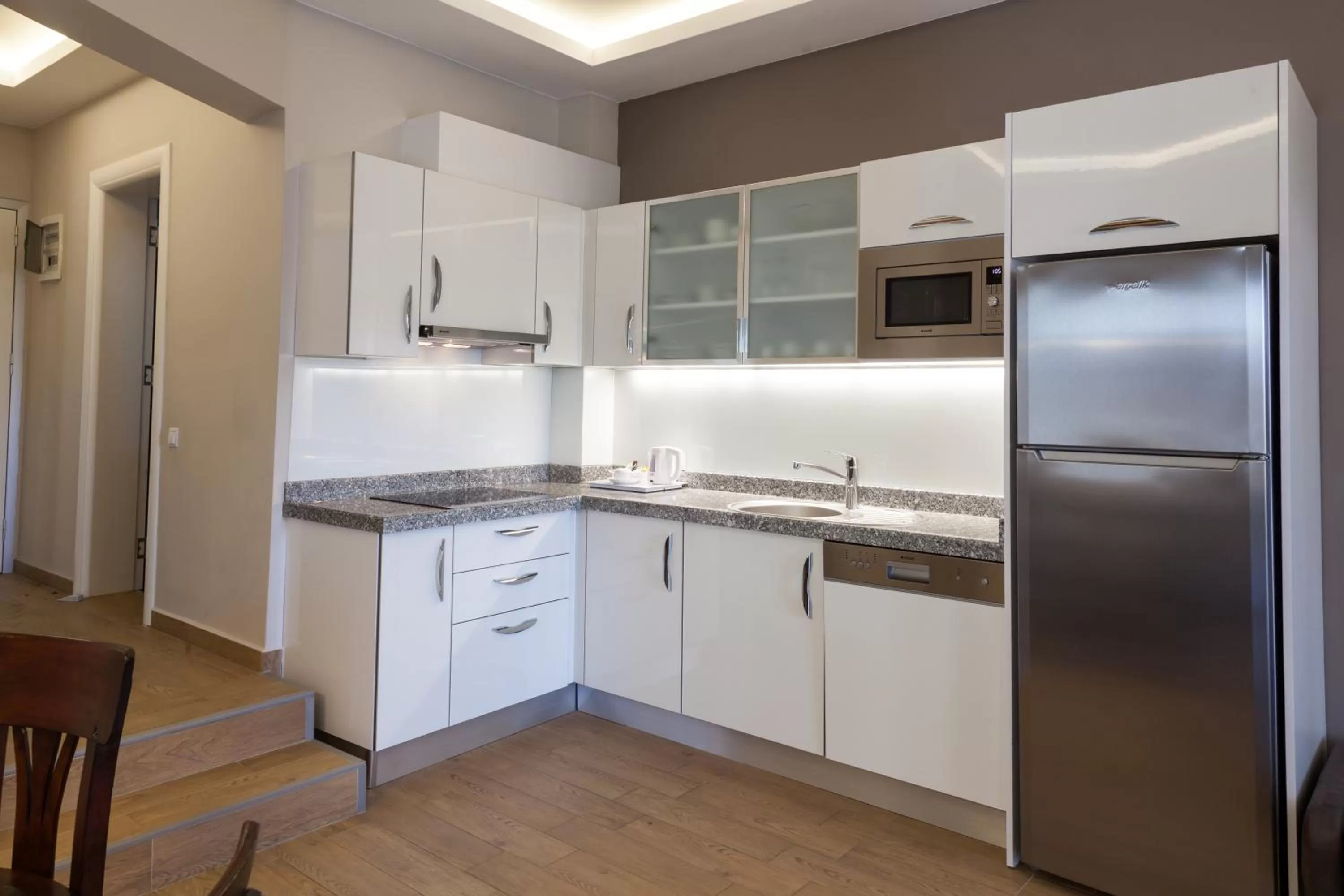 Kitchen or kitchenette in Sun Garden Apart Hotel