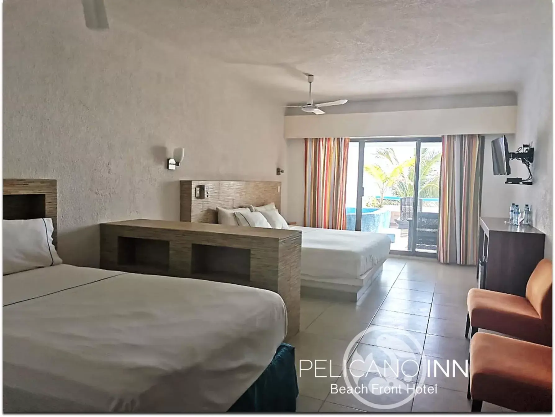 Photo of the whole room in Pelicano Inn Playa del Carmen - Beachfront Hotel