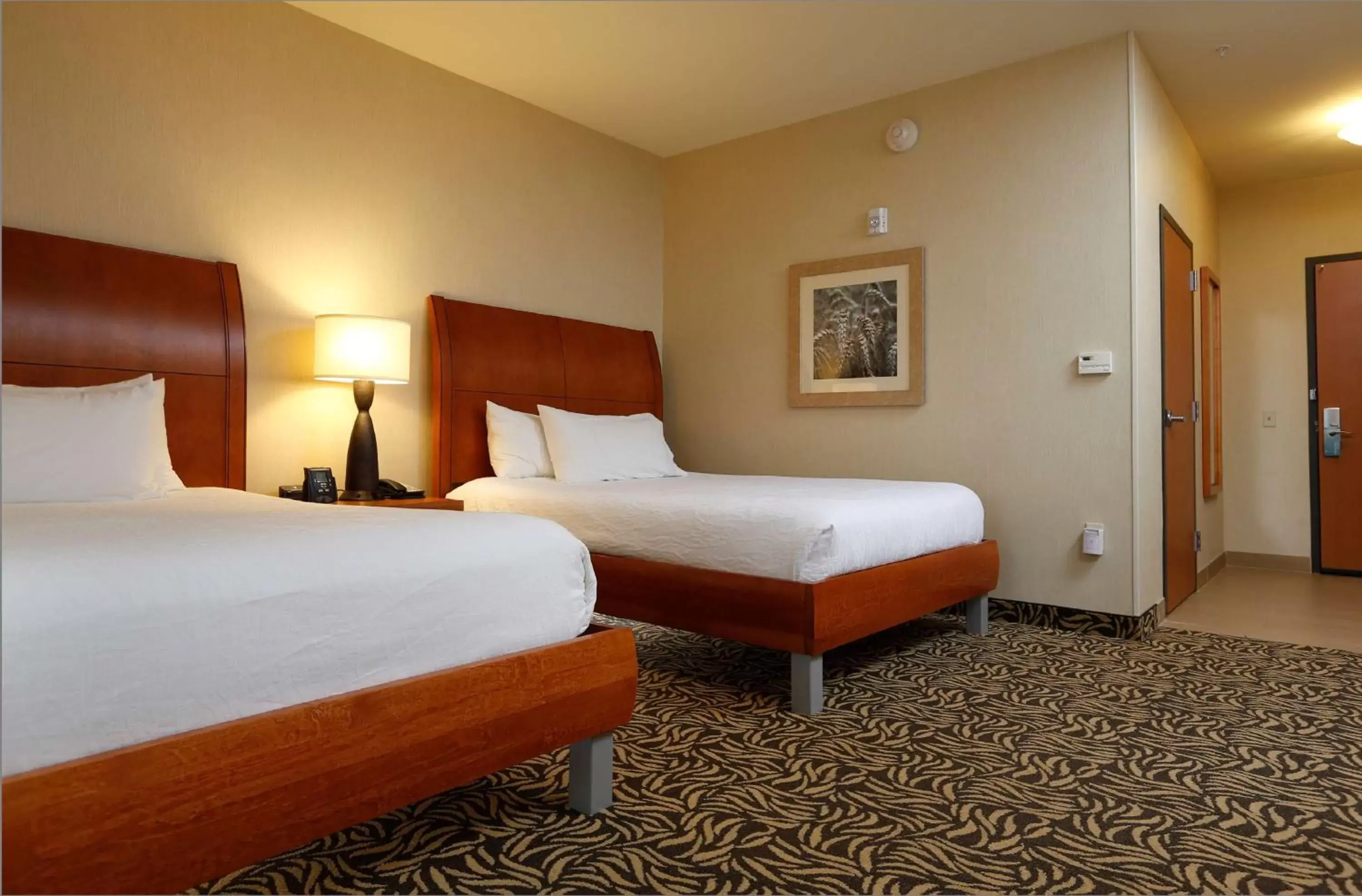 Photo of the whole room, Bed in Hilton Garden Inn Cedar Falls Conference Center