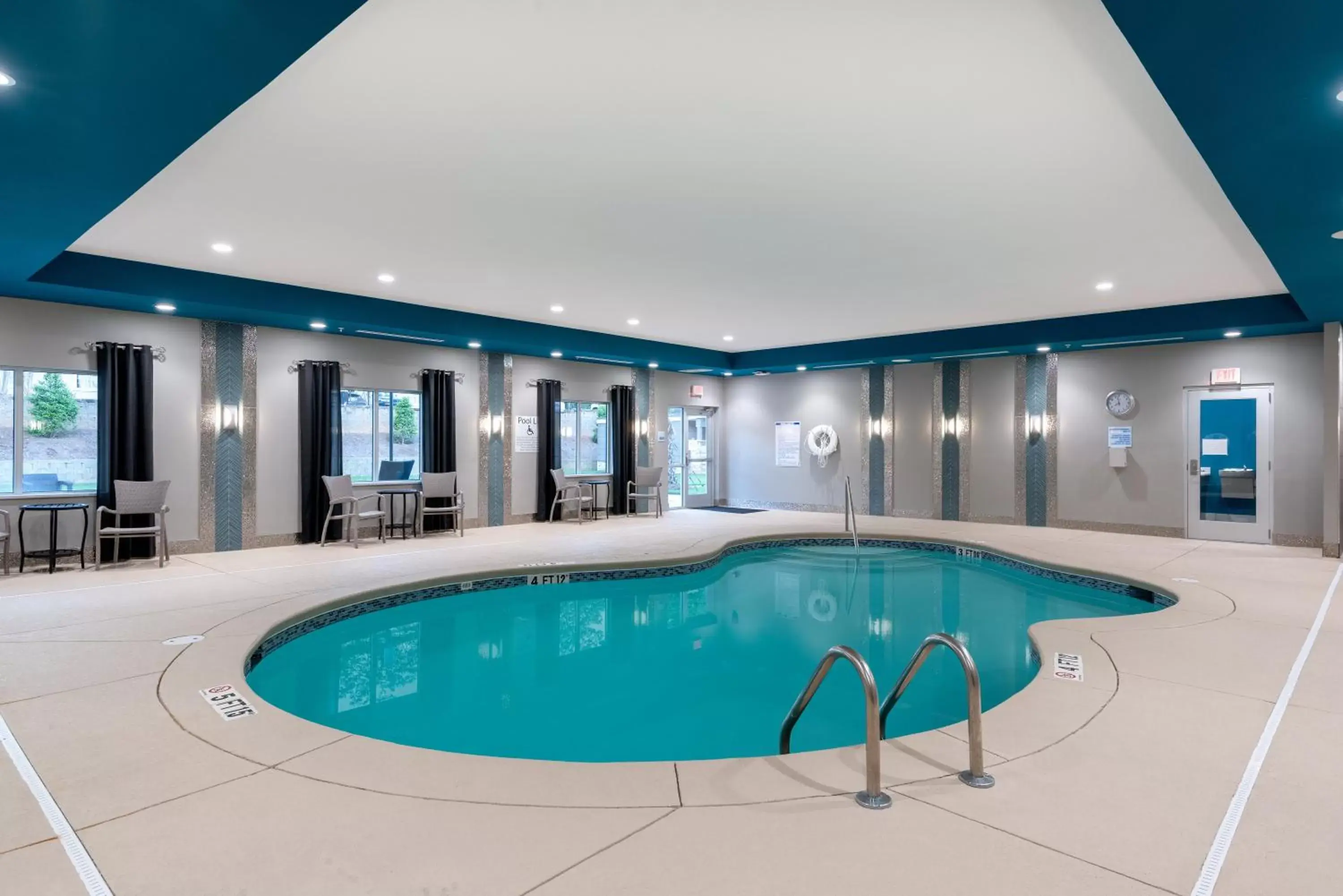 Swimming Pool in Holiday Inn Express & Suites - Charlotte Airport, an IHG Hotel