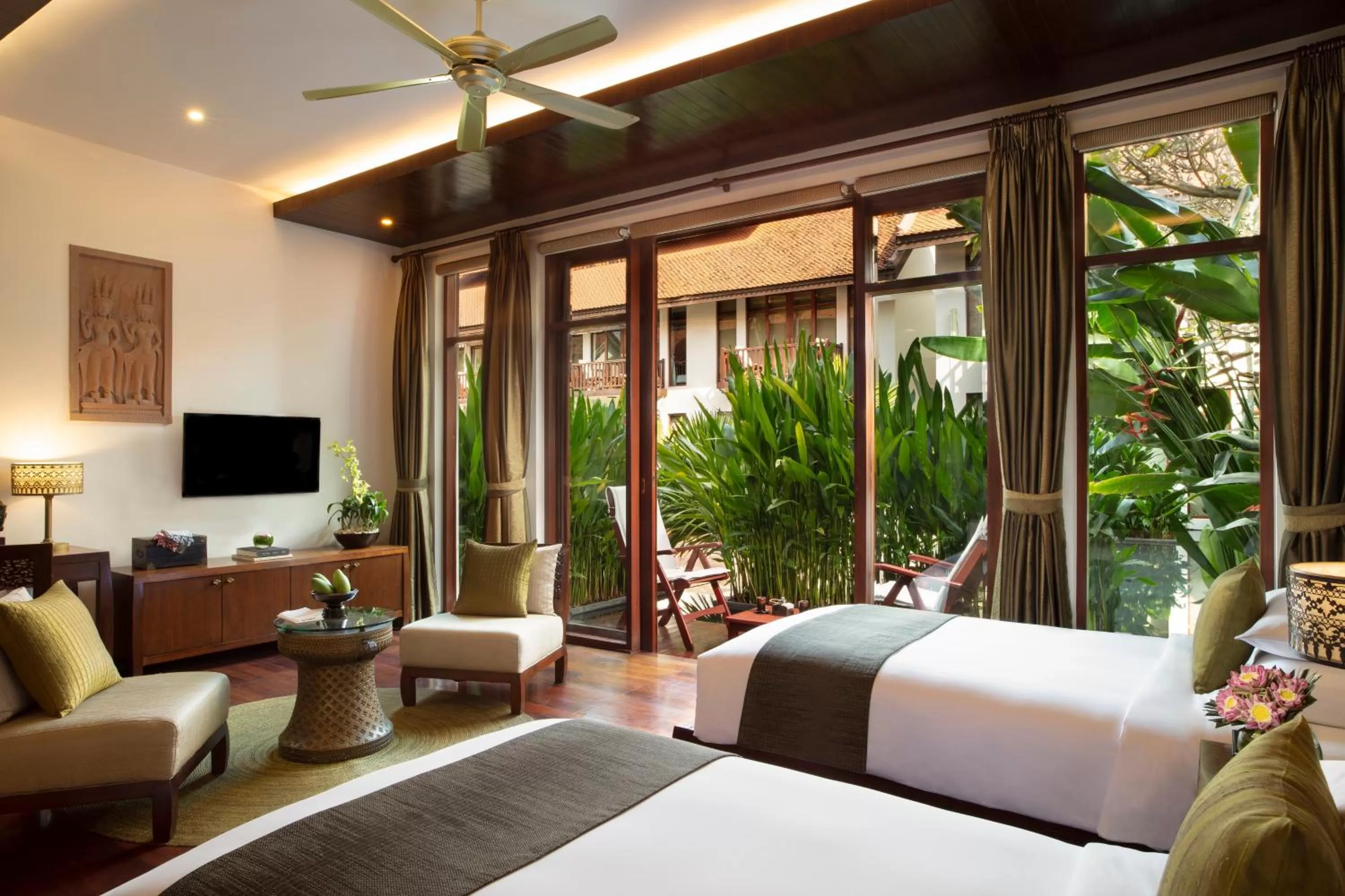 Photo of the whole room, Bed in Anantara Angkor Resort