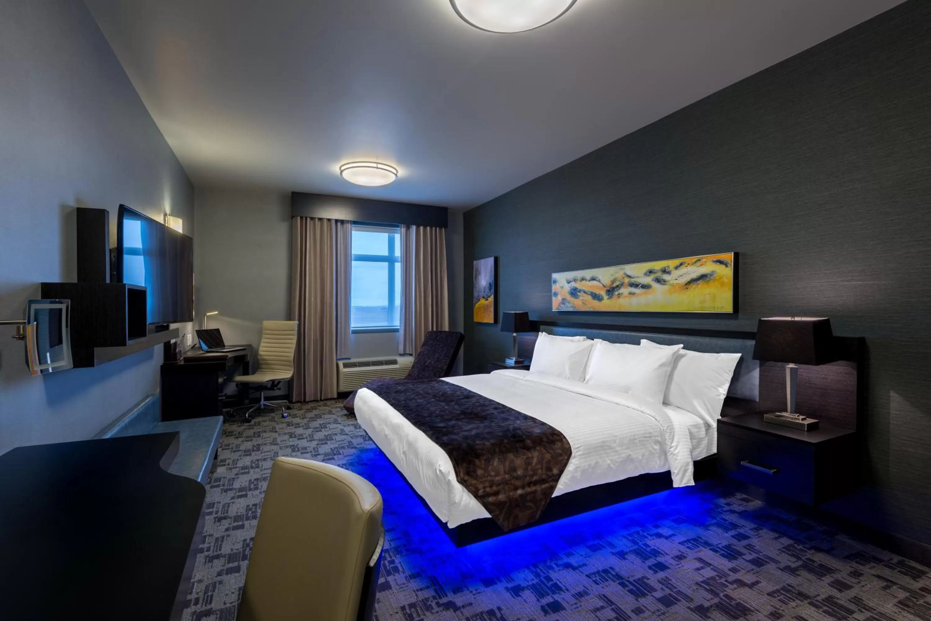 Photo of the whole room, Bed in Applause Hotel Calgary Airport by CLIQUE