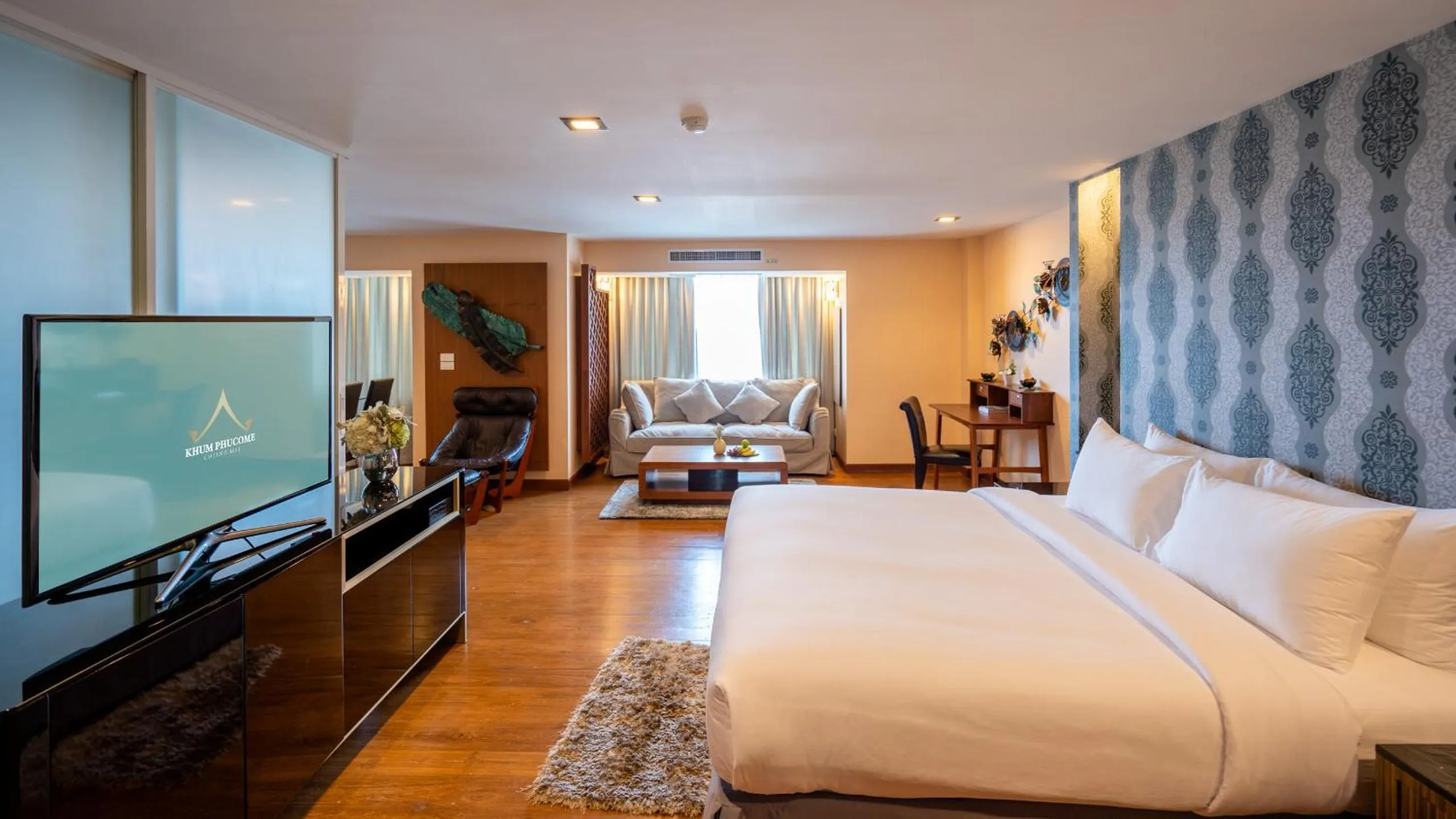 Photo of the whole room, Bed in Khum Phucome Hotel -SHA Extra Plus