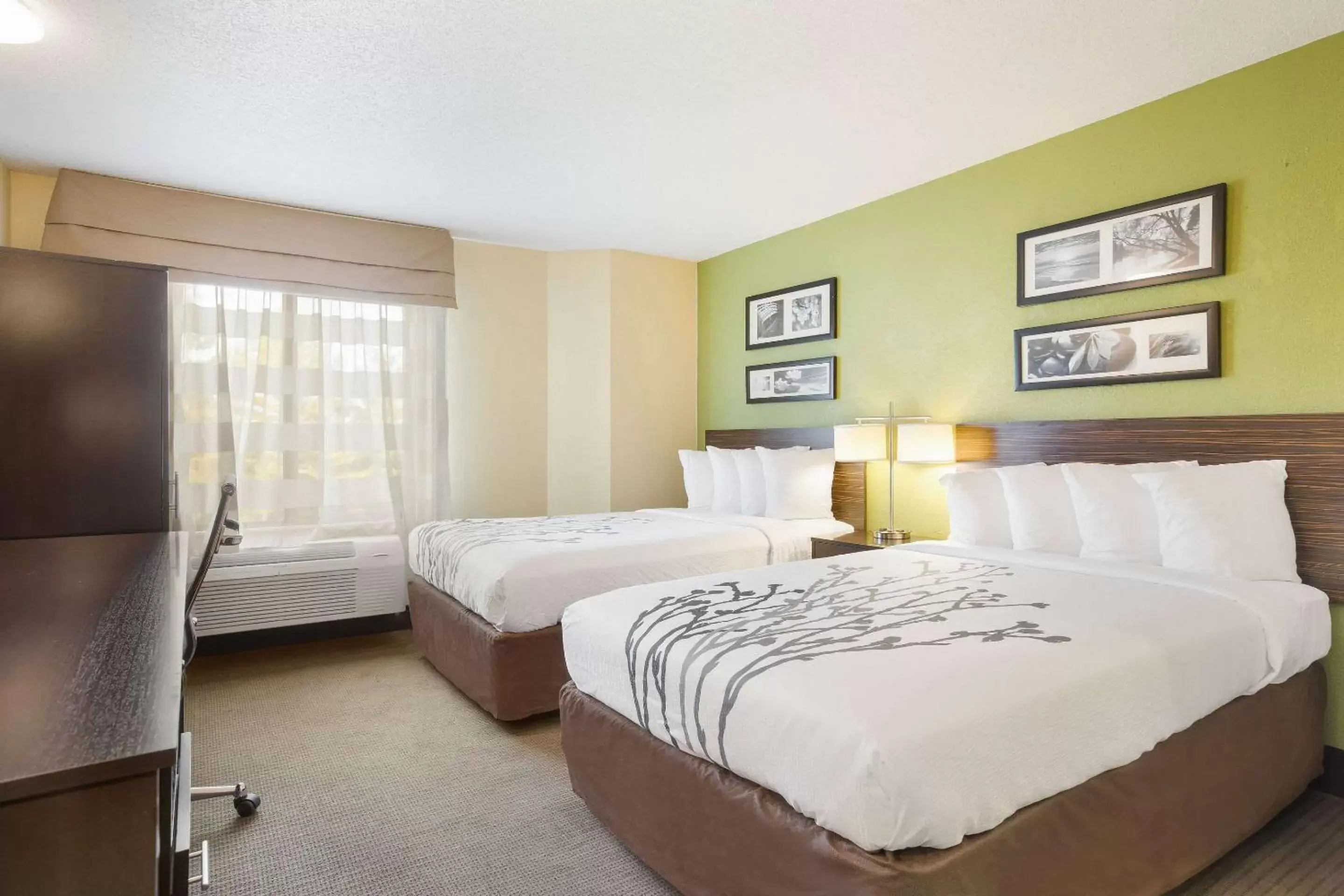 Photo of the whole room, Bed in Sleep Inn & Suites