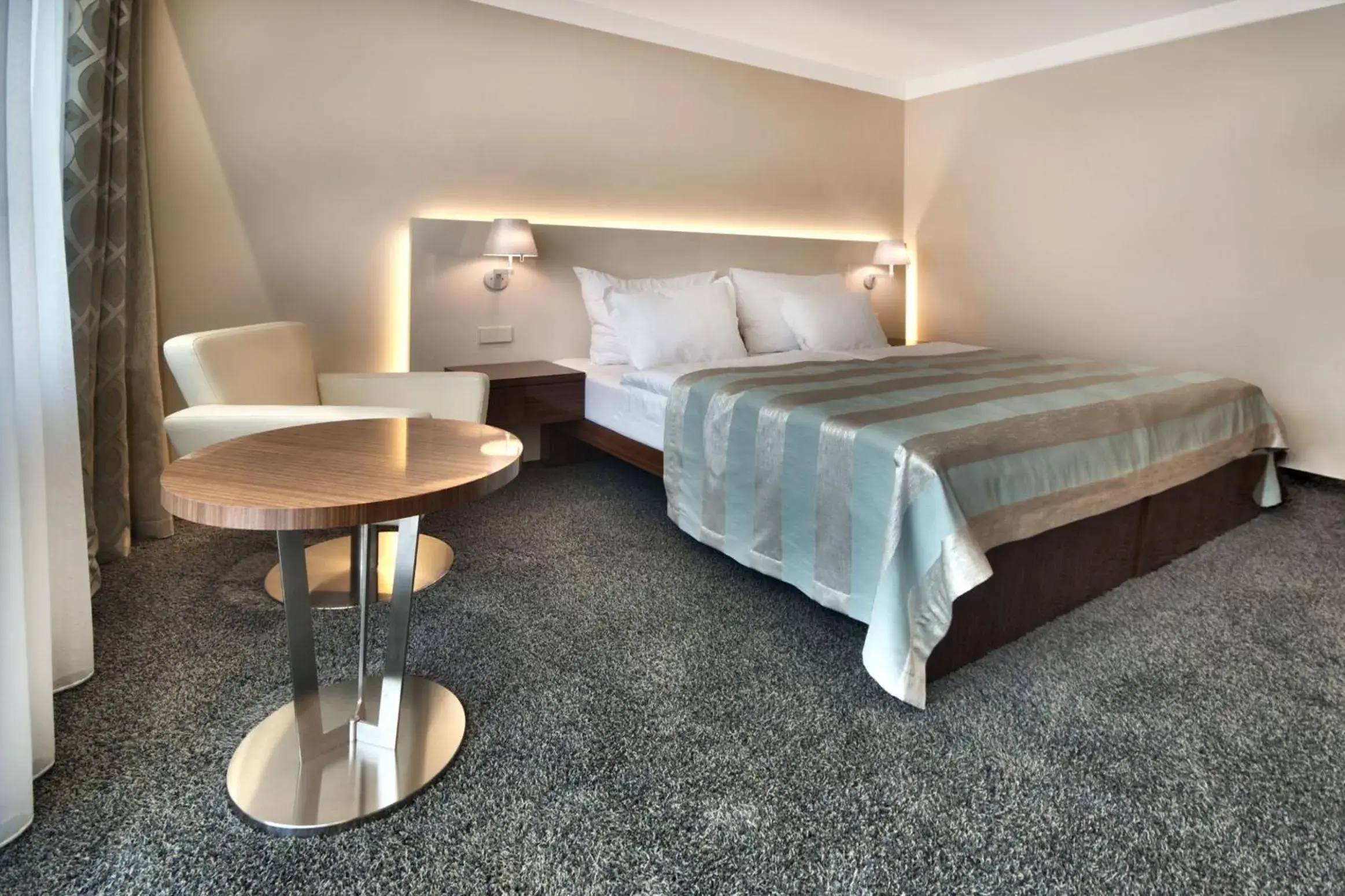 Bed in Prezident Luxury Spa & Wellness Hotel