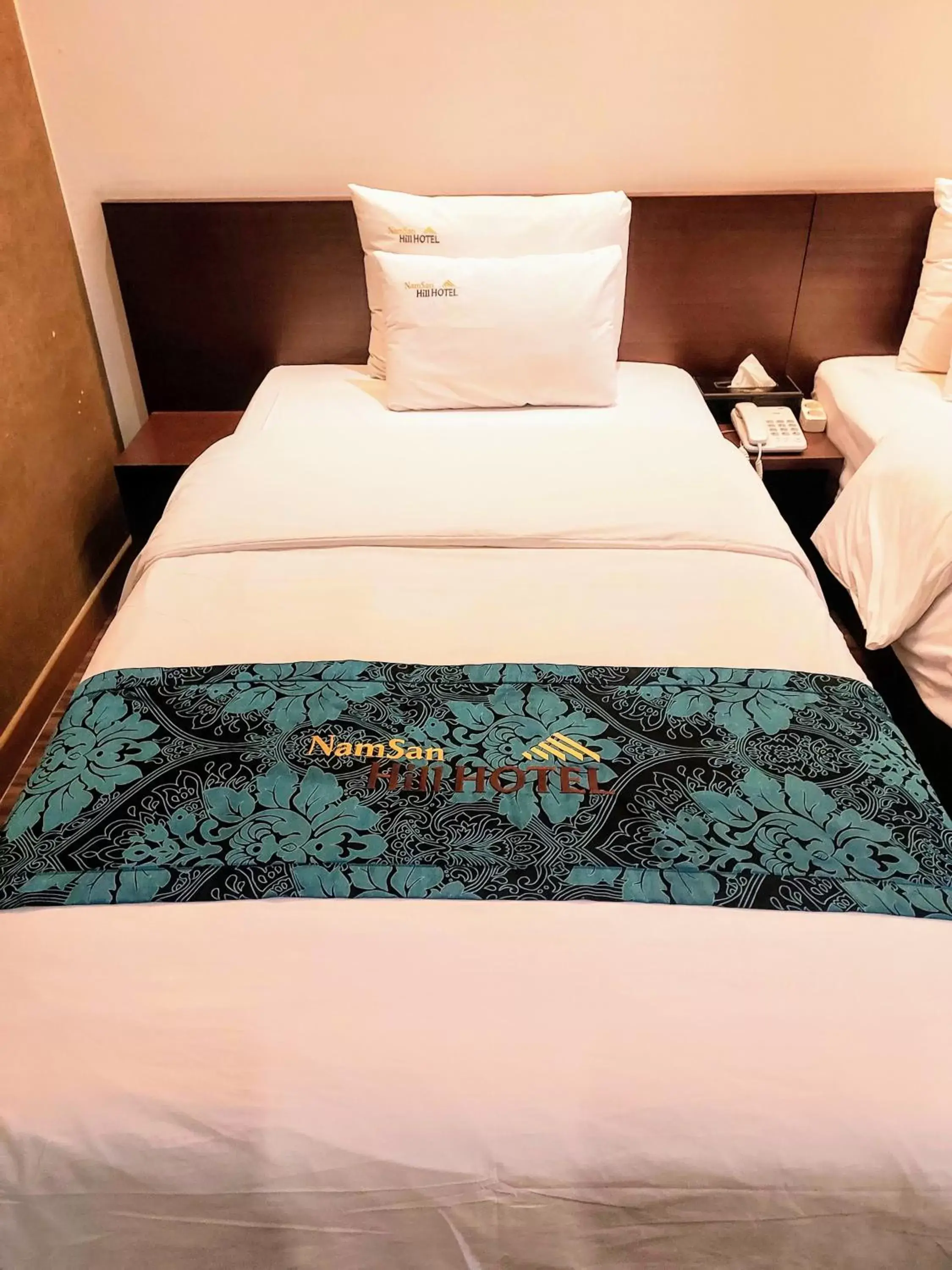 Bed in Namsan Hill Hotel