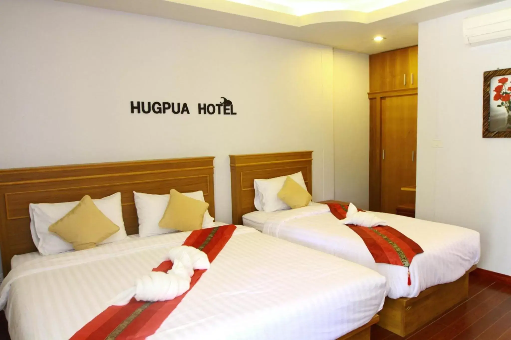 Bed in Hugpua Hotel