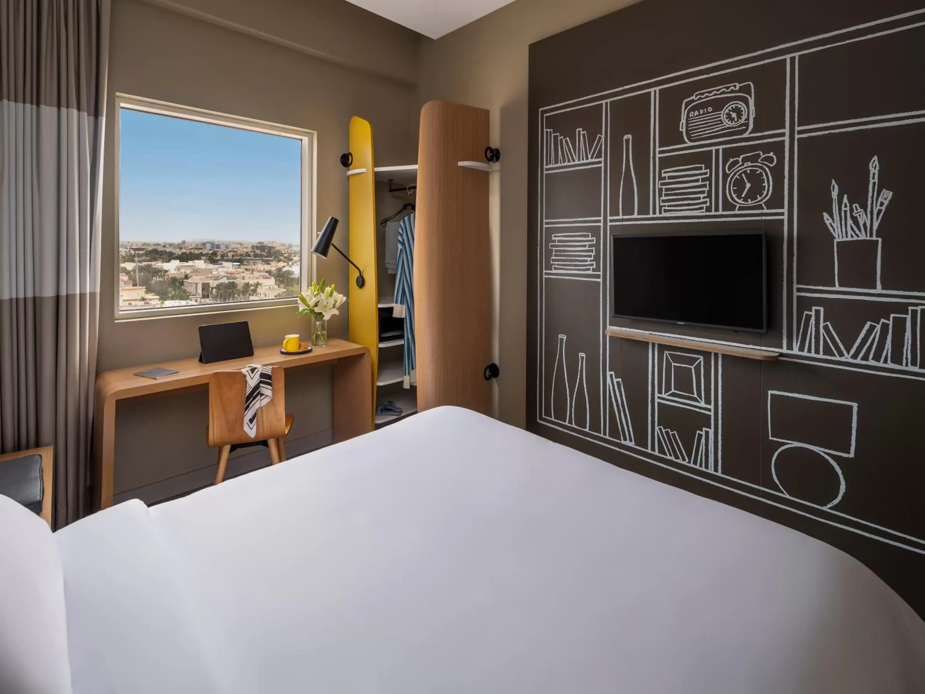 Photo of the whole room, TV/Entertainment Center in Ibis Jeddah Malik Road