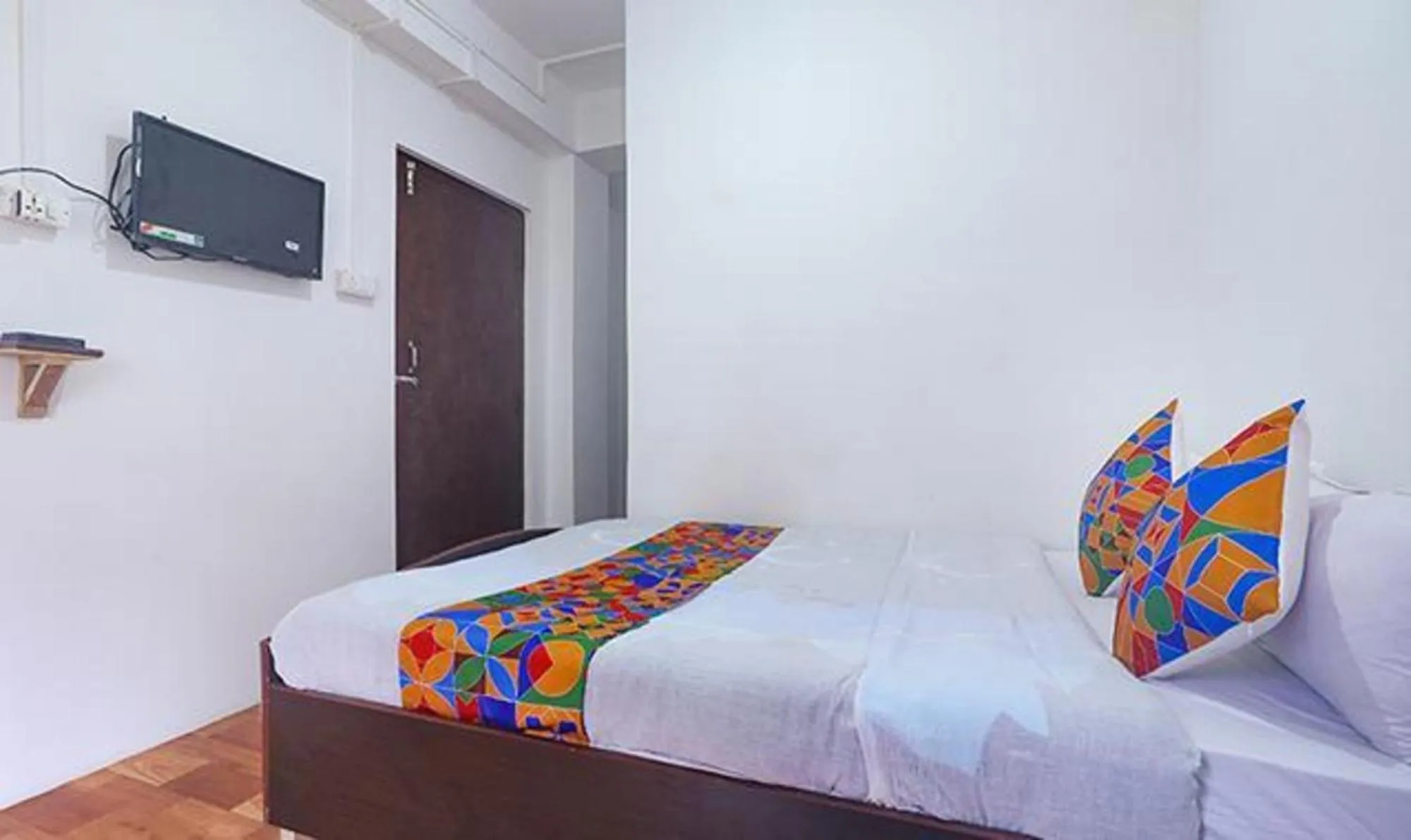 Bed in FabExpress Laxmi Niwas