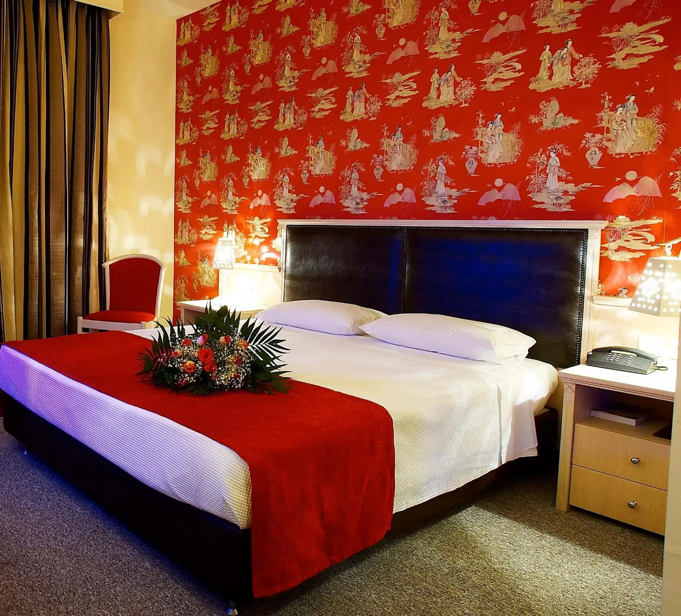 Bed in Iris Hotel
