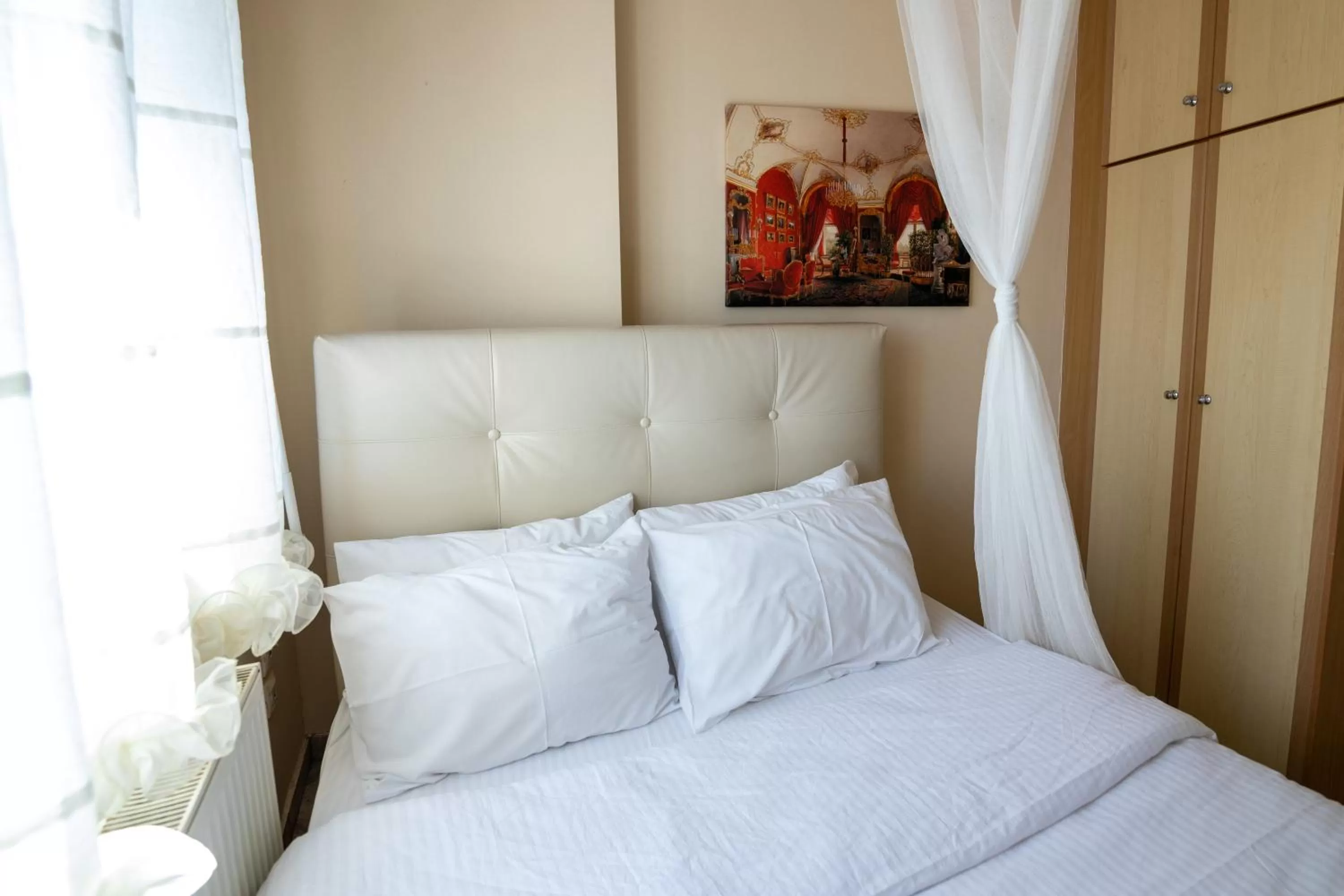 Bed in Votsalakia Hotel & Luxury Apartments