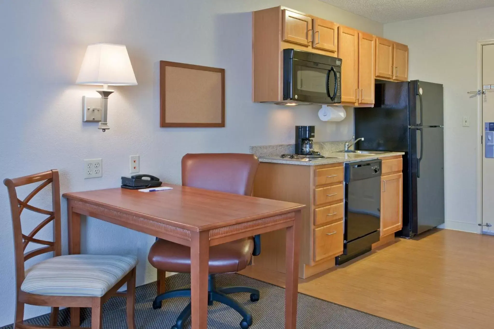 Bedroom, Kitchen/Kitchenette in Candlewood Suites Nogales, an IHG Hotel