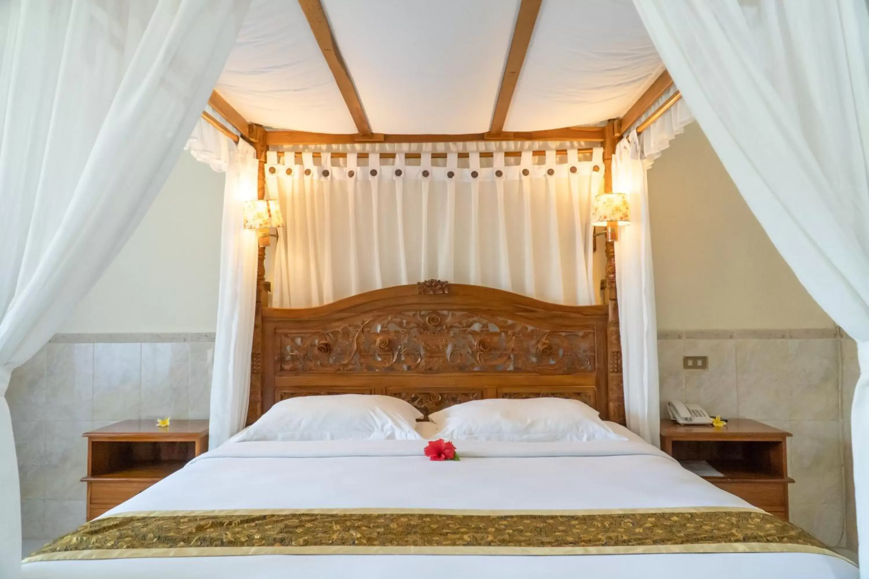 Bed in Palm Beach Hotel Bali