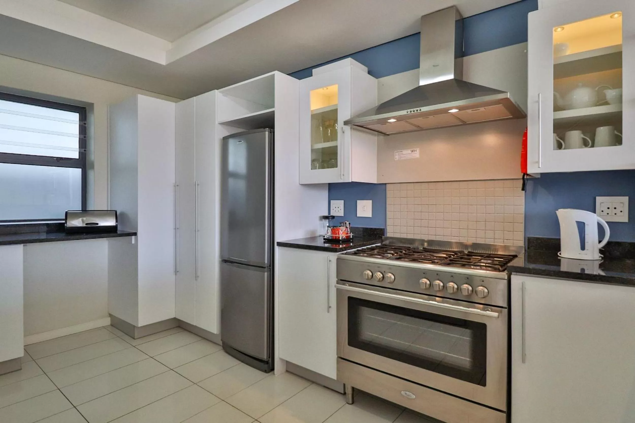 Kitchen or kitchenette in Whale Coast All-Suite-Hotel - DCC Hotel Group