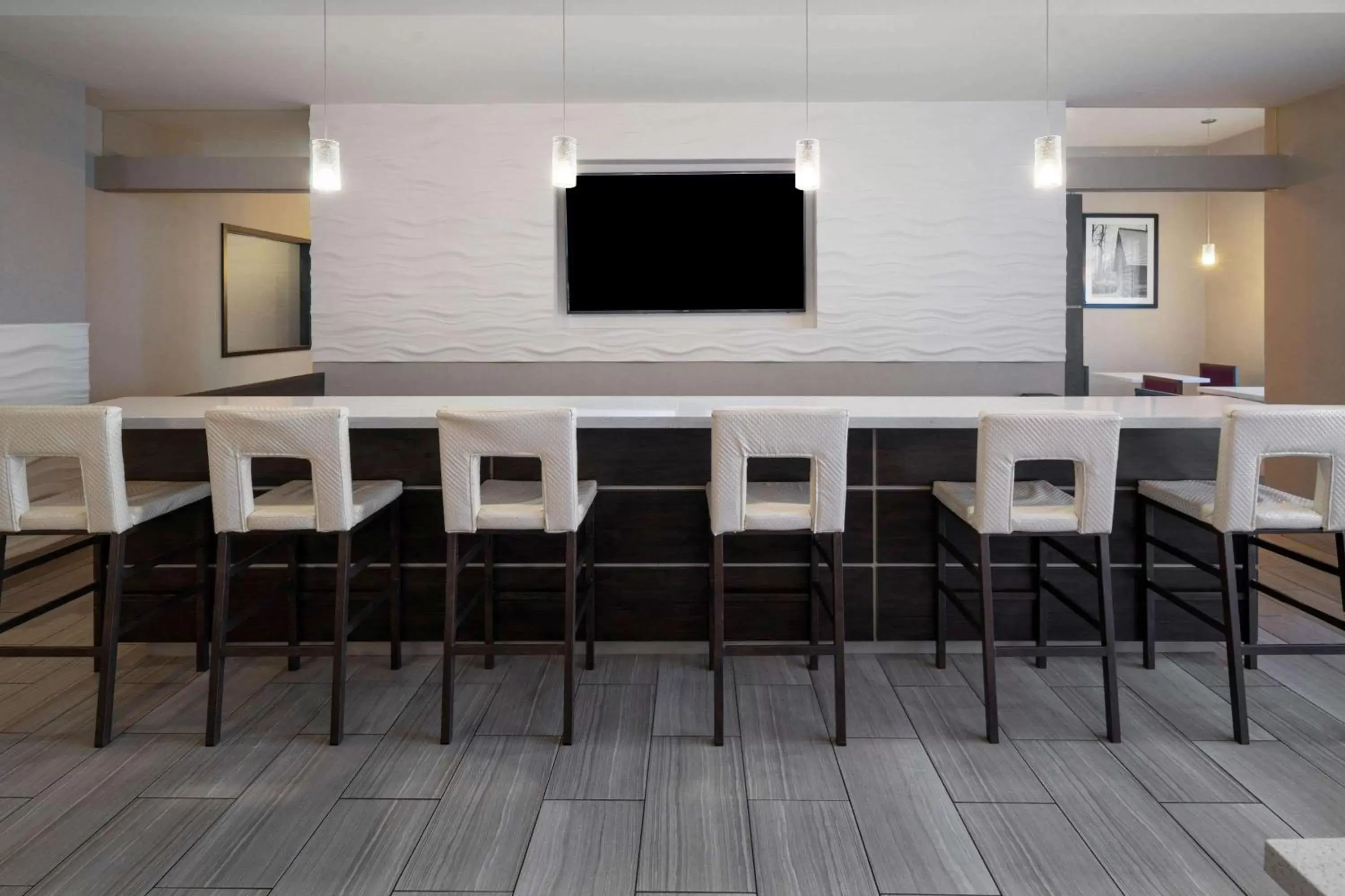 Communal lounge/ TV room in La Quinta by Wyndham Forsyth Communal lounge/ TV room in La Quinta by Wyndham Forsyth