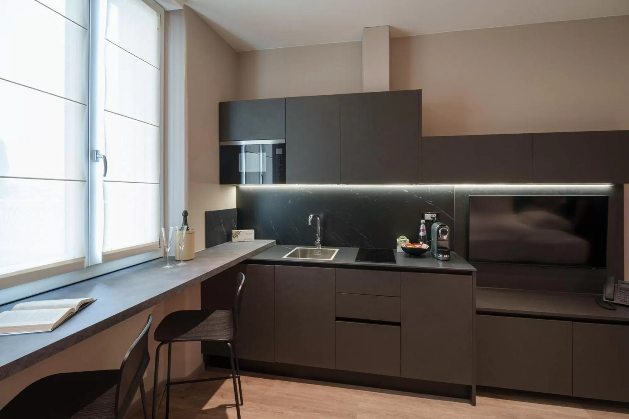 Kitchen or kitchenette in Vi Suites
