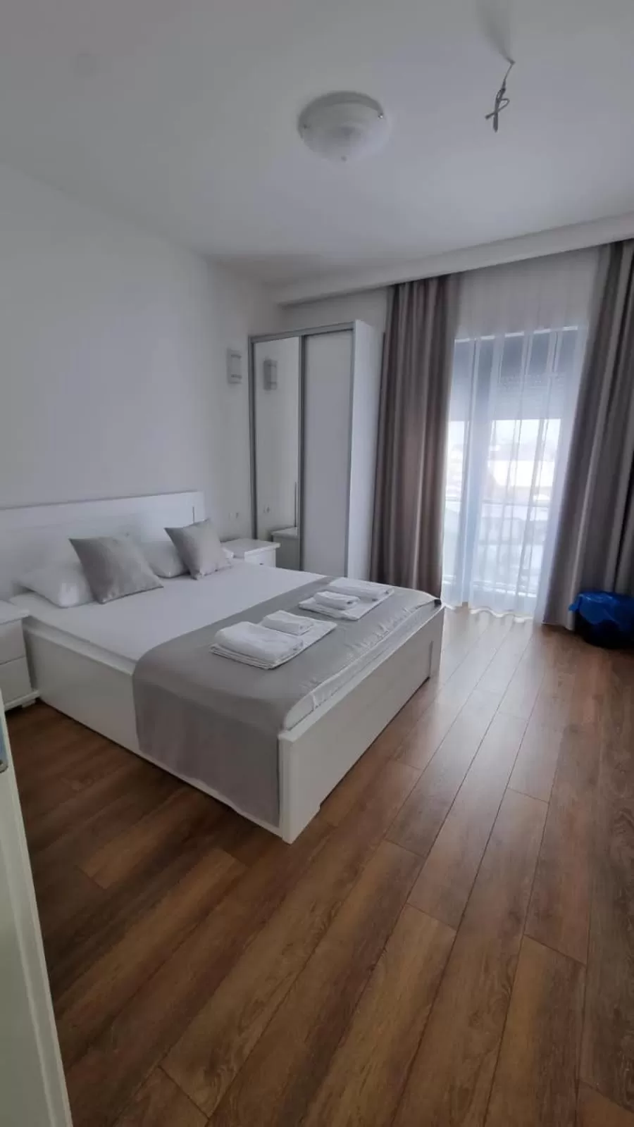 Bed in Elan Luxury Apartments & Rooms