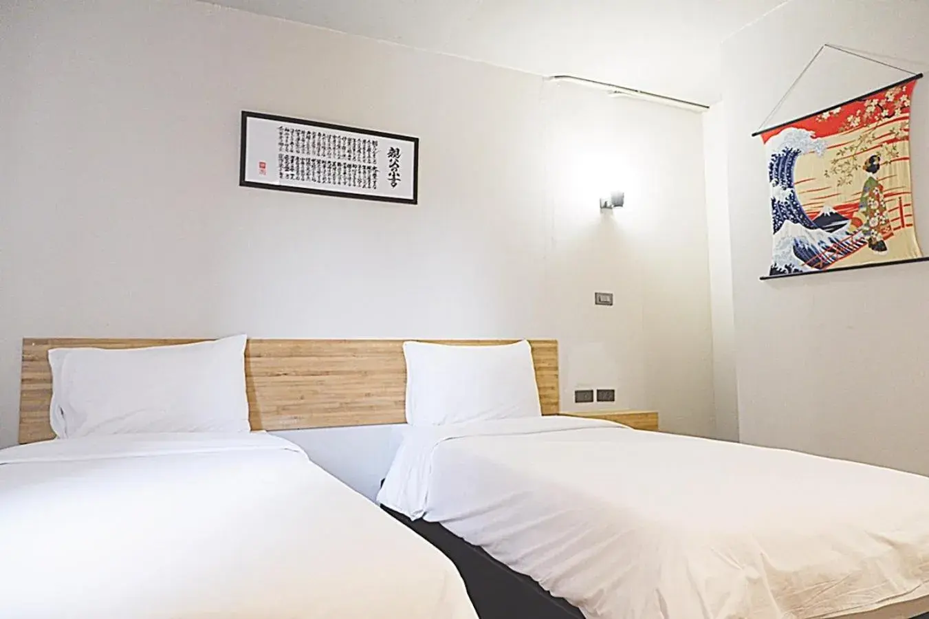 Bed in IZEN Budget Hotel & Residences (Plus)