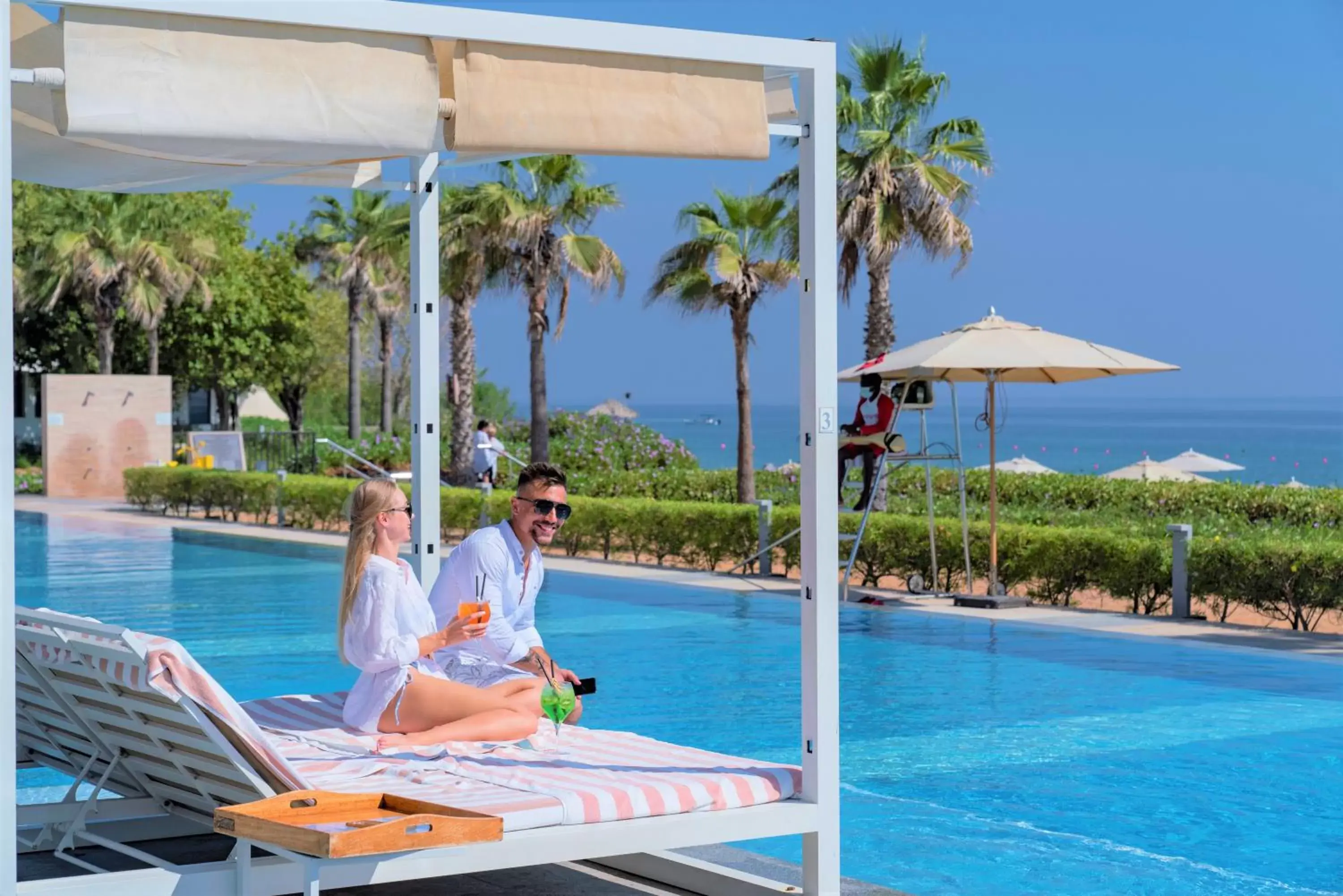 People, Swimming Pool in InterContinental Fujairah Resort, an IHG Hotel