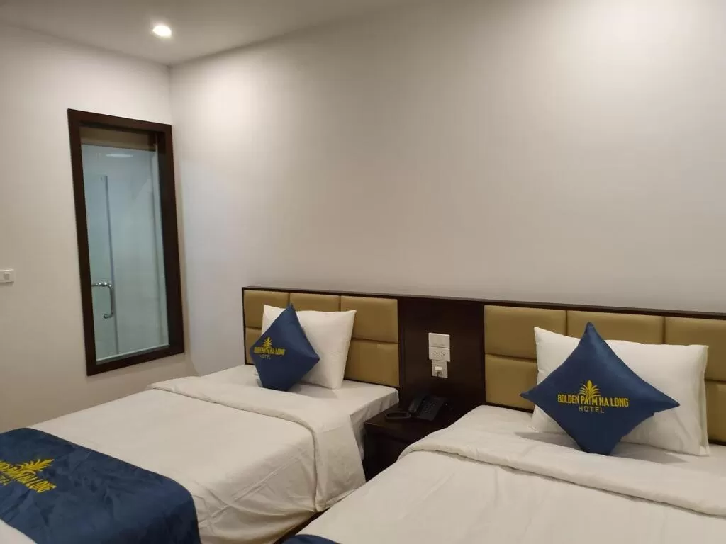 Bed in Golden Palm HaLong Hotel