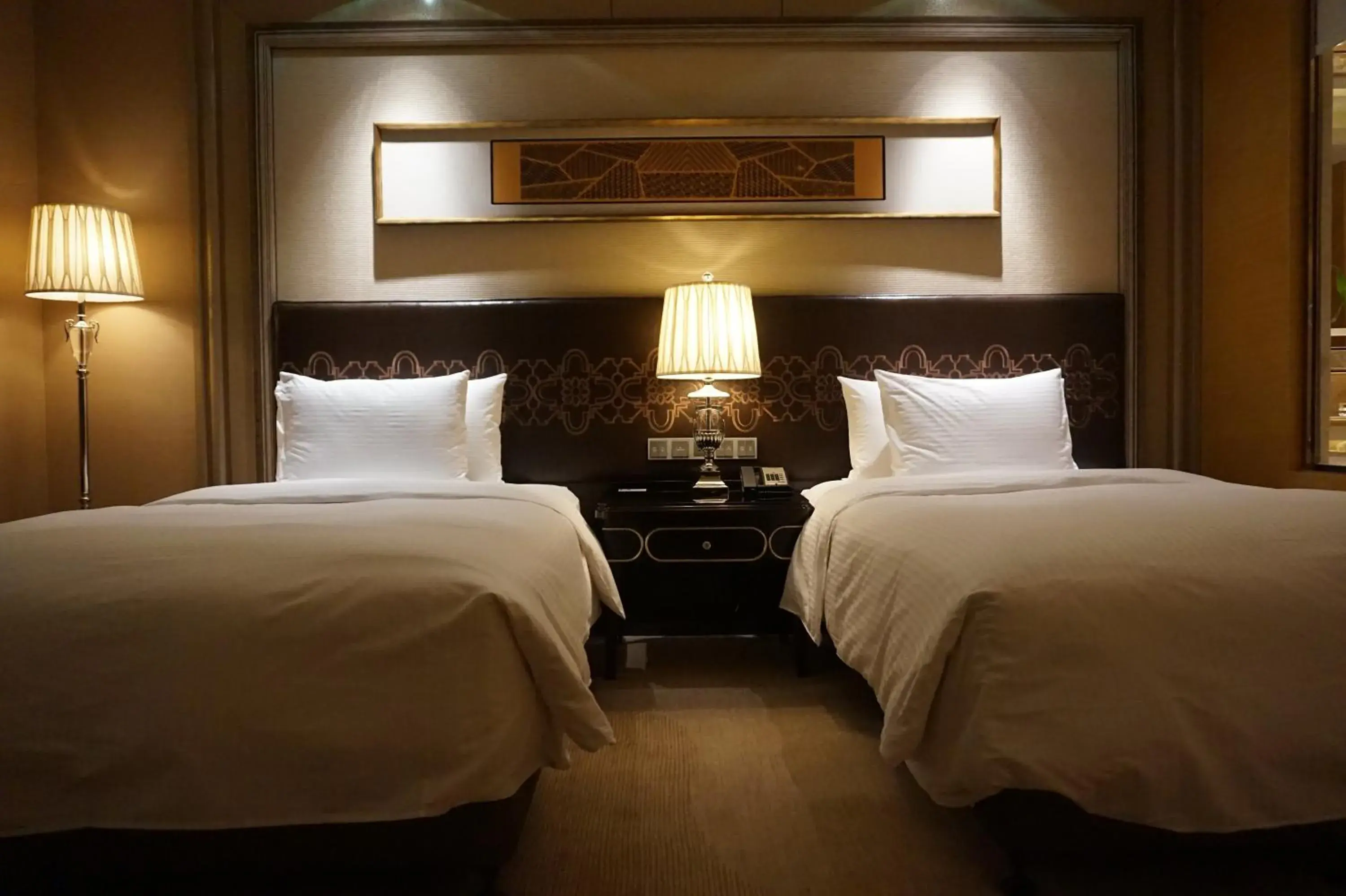 Bed in Wanda Realm Harbin Hotel