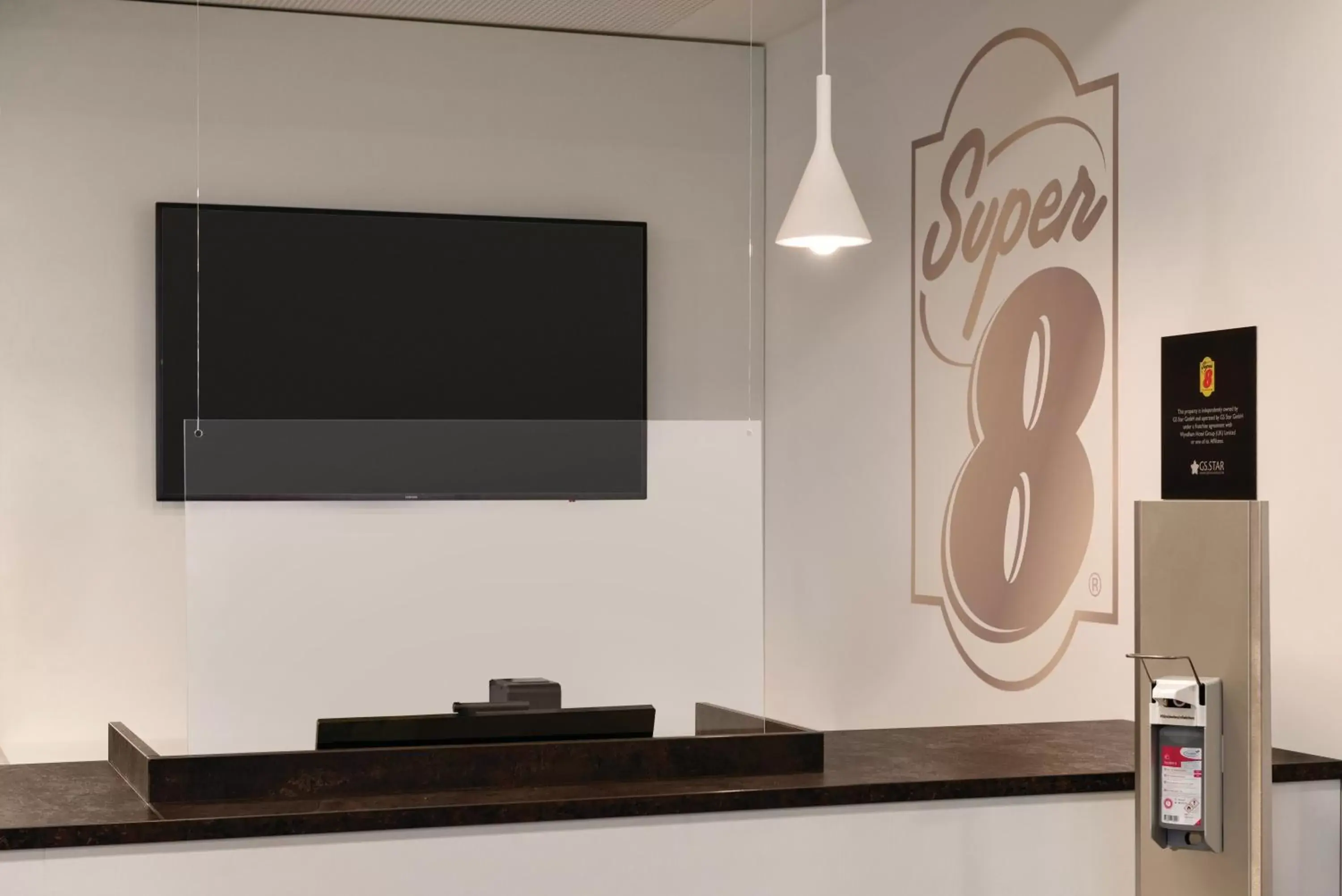 Lobby or reception in Super 8 by Wyndham Augsburg Lobby or reception in Super 8 by Wyndham Augsburg