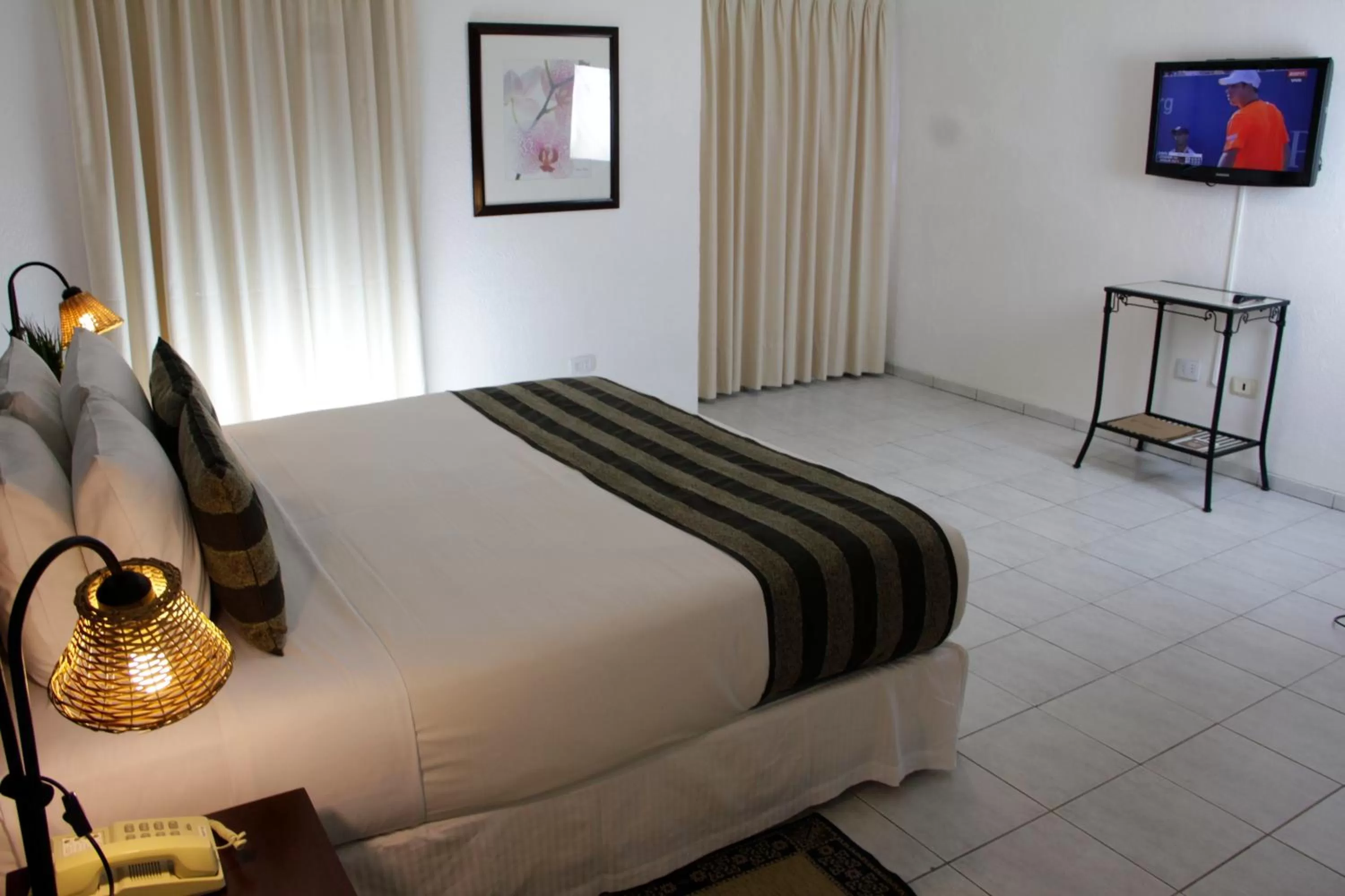 Bedroom in Buganvillas Hotel Suites