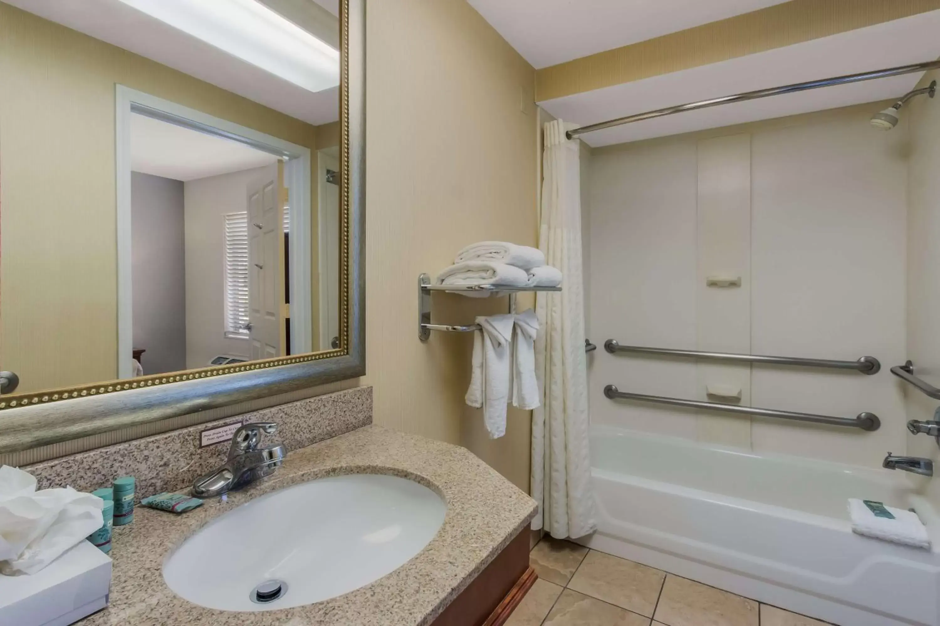 Bathroom in SureStay Plus Hotel by Best Western Tempe University