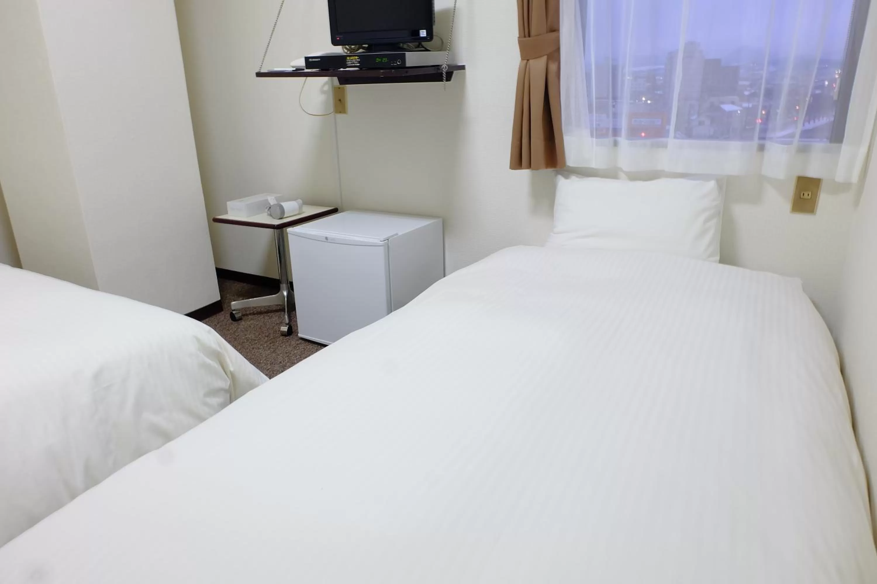 Bed in Tabist Hotel Tetora Hakodate Station