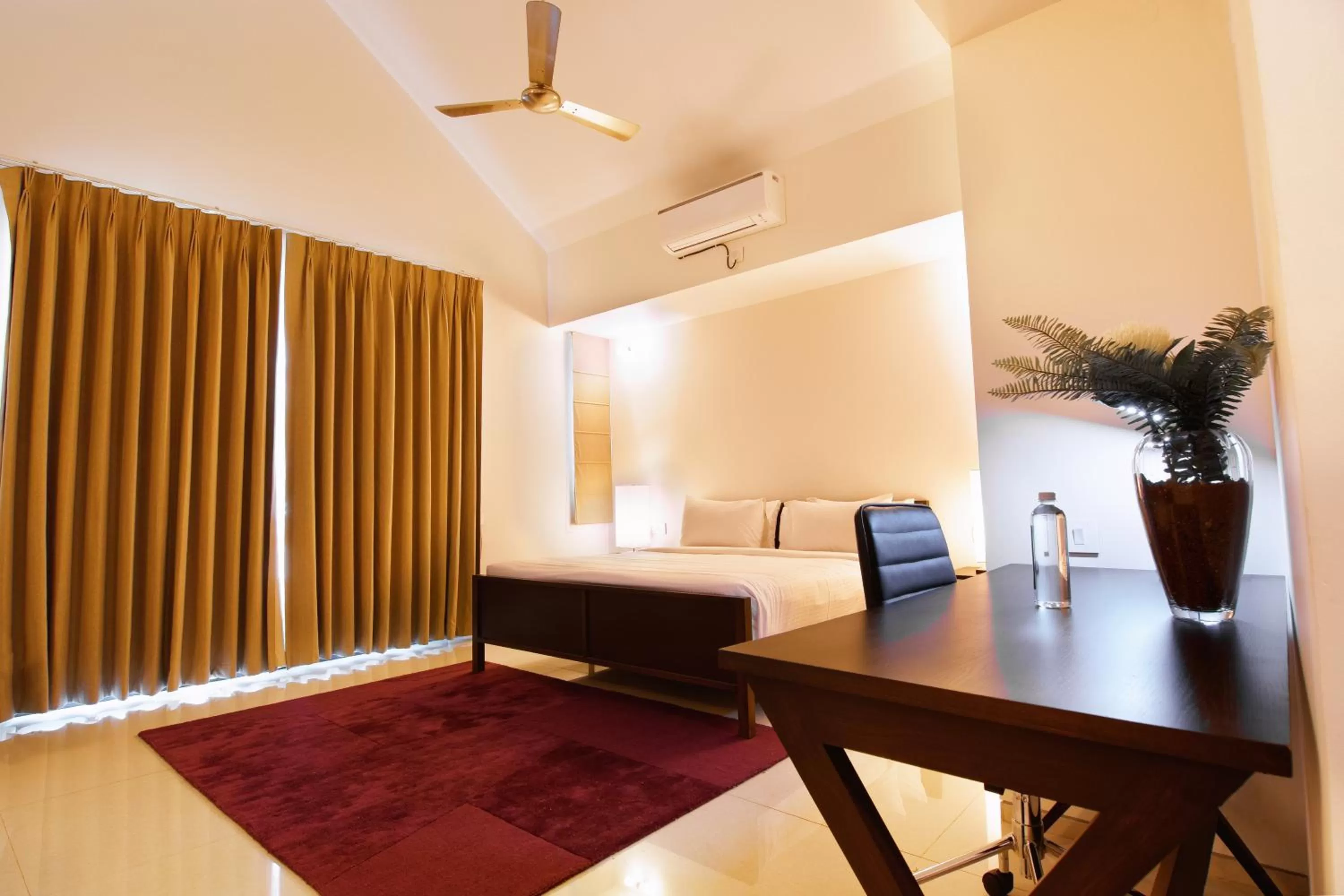 Bed in Signature Club Resort