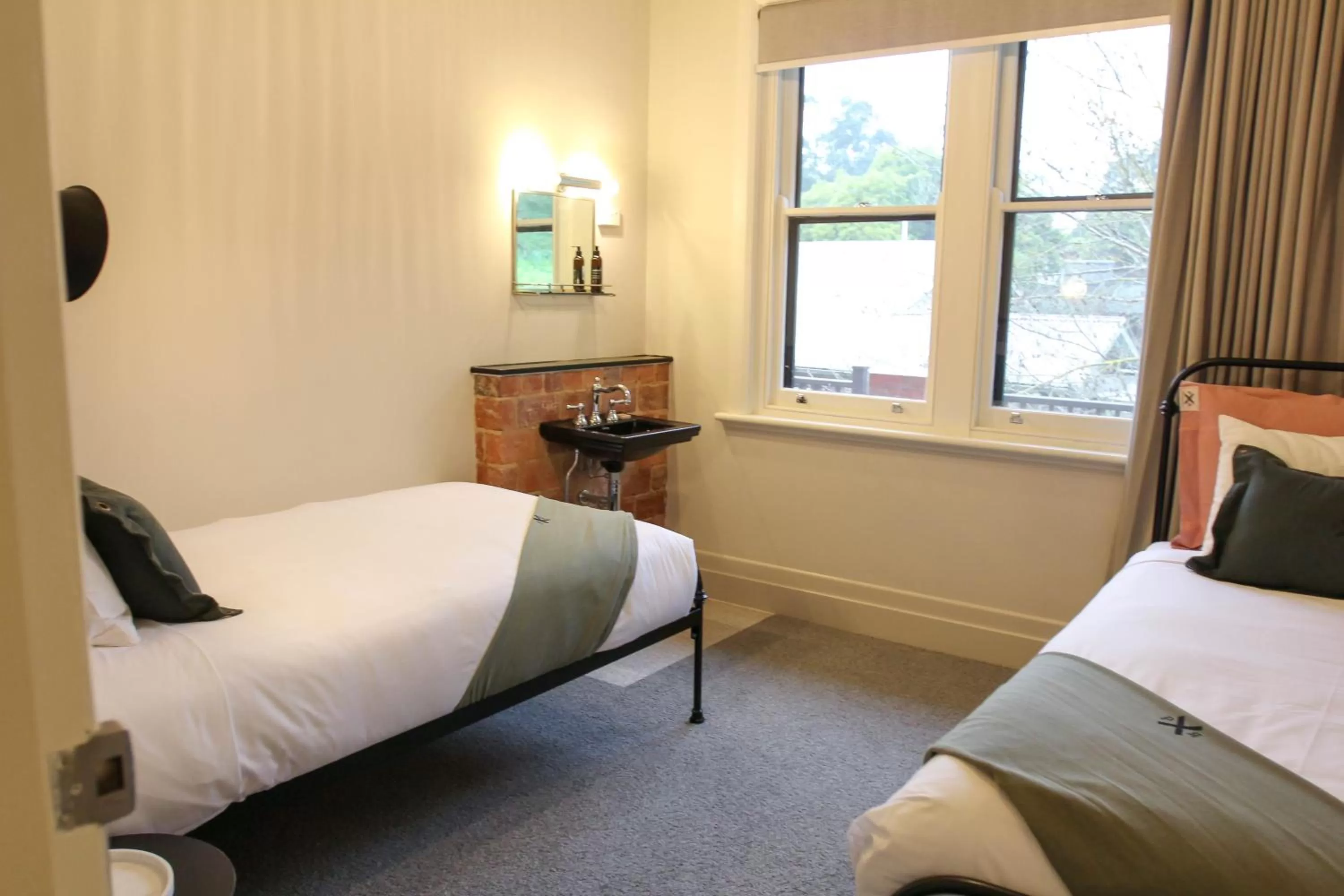 air conditioner, Bed in Alpine Hotel, Eat Drink Sleep