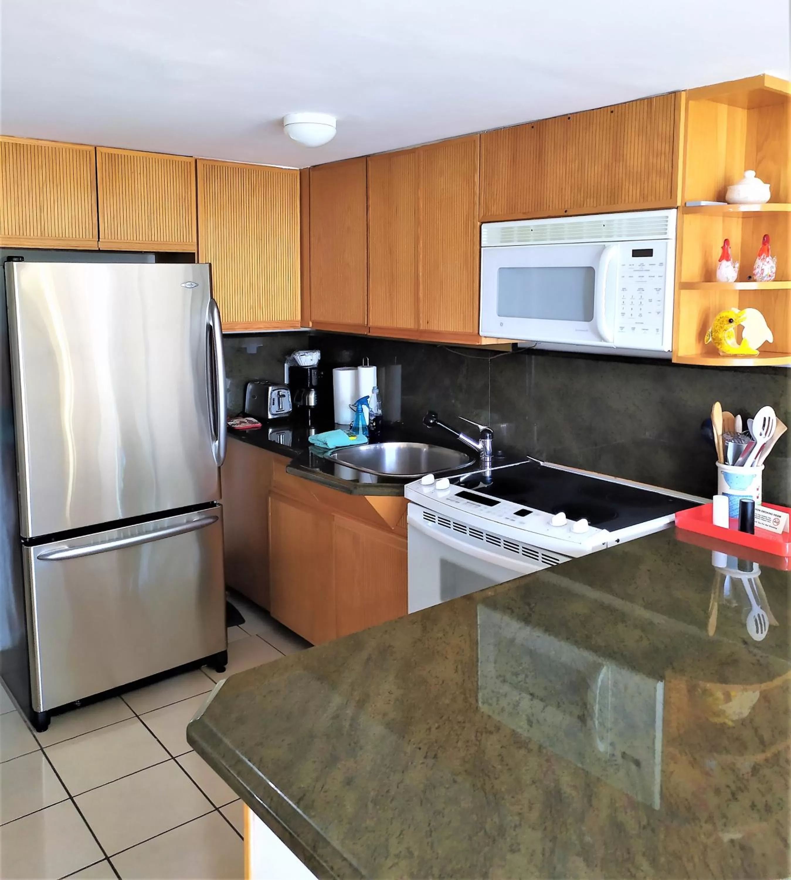 Kitchen or kitchenette in Manhattan Tower Apartment Hotel