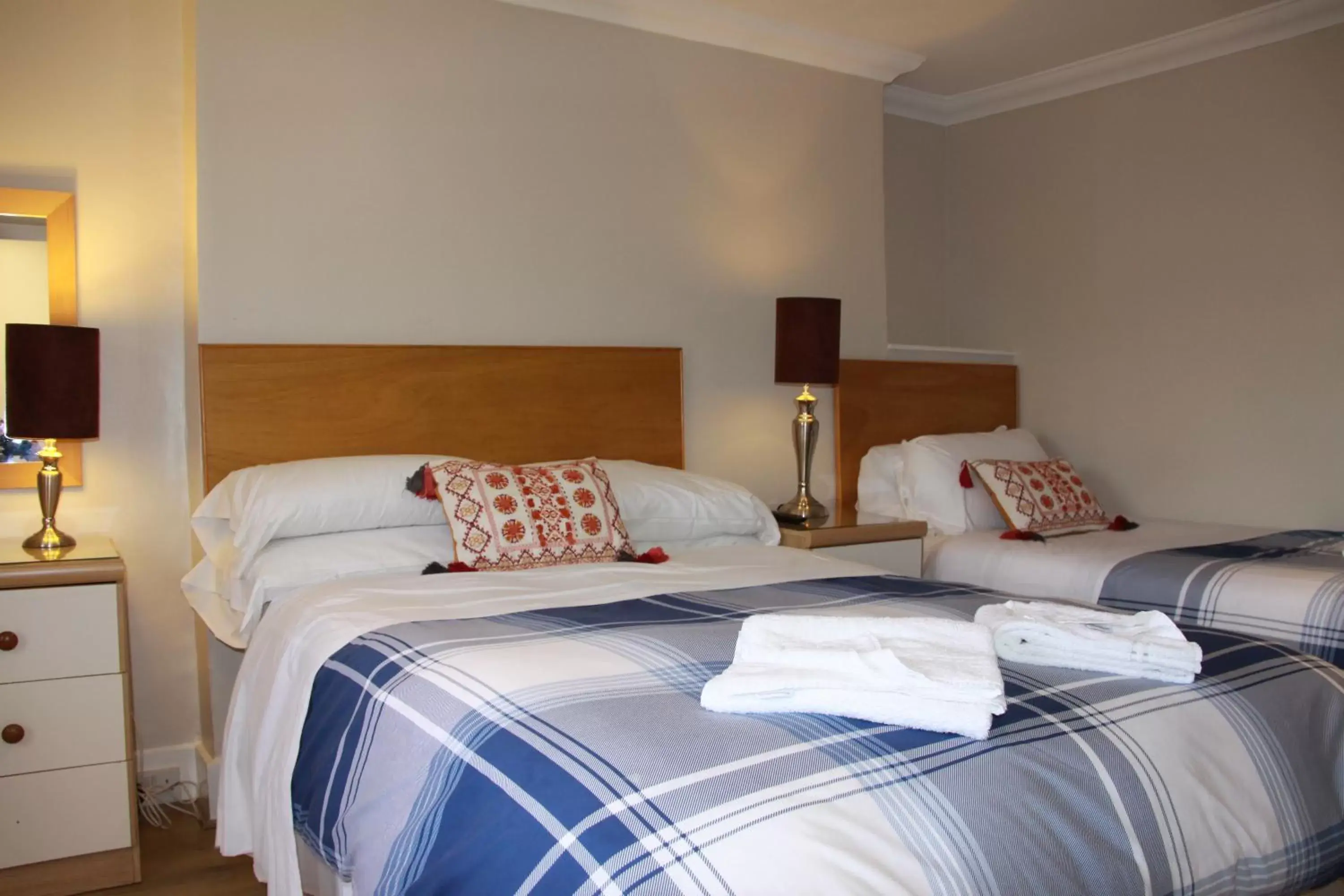 Bed in Ambassador Hotel