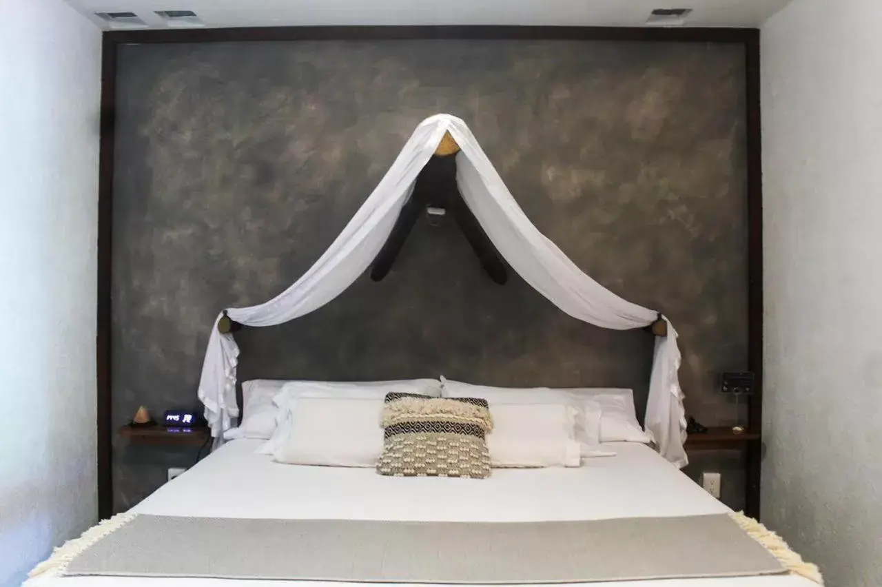 Bed in Casa de Olas Boutique Hotel
